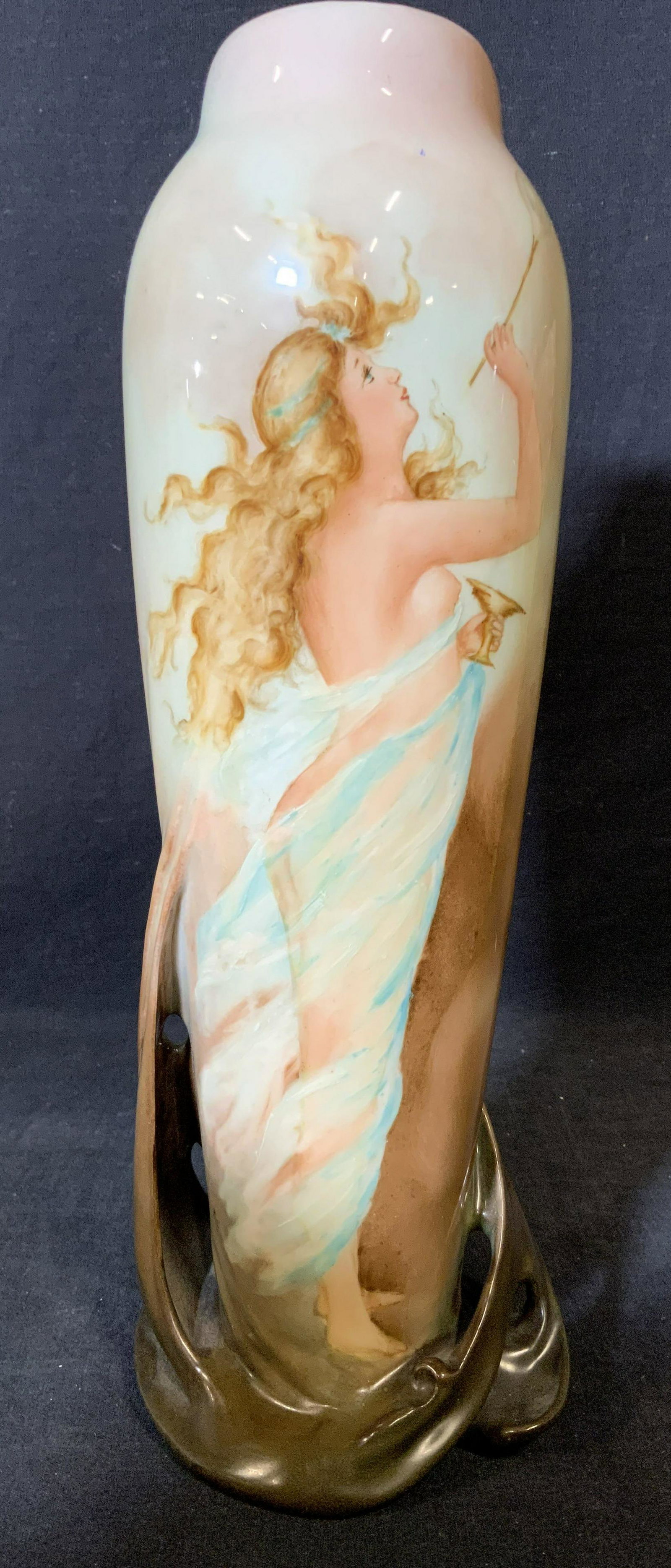 Hand Painted Ceramic Vase: Hand painted ceramic vase, no apparent inscriptions or markings, pictorial scene to surface of vase depicts. Blonde haired woman mostly nude blowing bubbles, rim of vase gilt, piece measures approxima