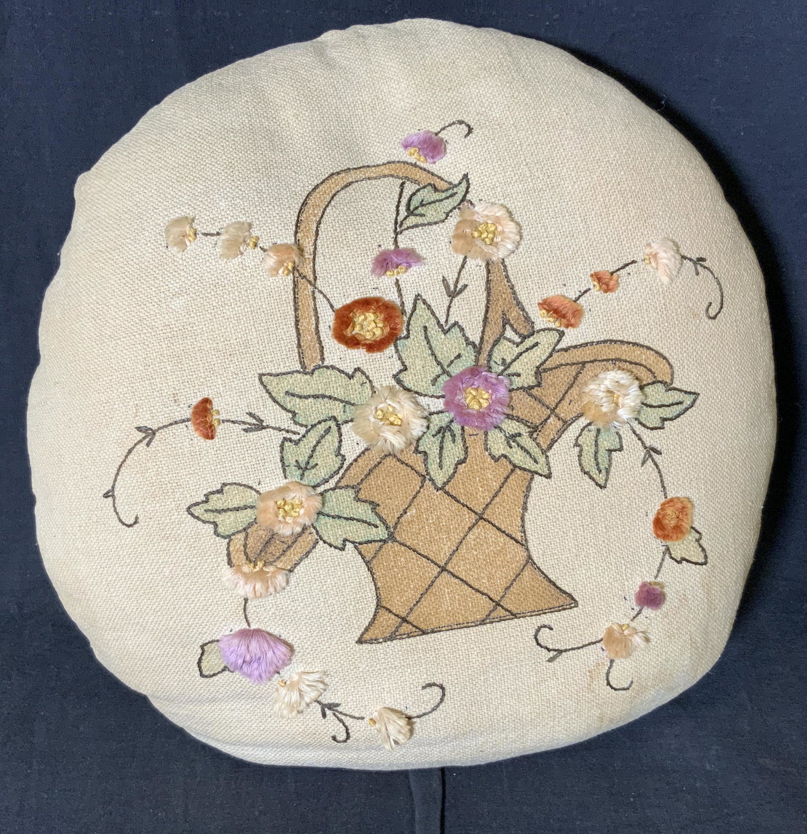 Hand Painted & Embroidered Pillow: Hand Painted & embroidered pillow, pictorial scene to pillow depicts a basket with flowers, elements of pillow have been hand painted, pillow is circular and measures 14 inches in diameter, some wear 