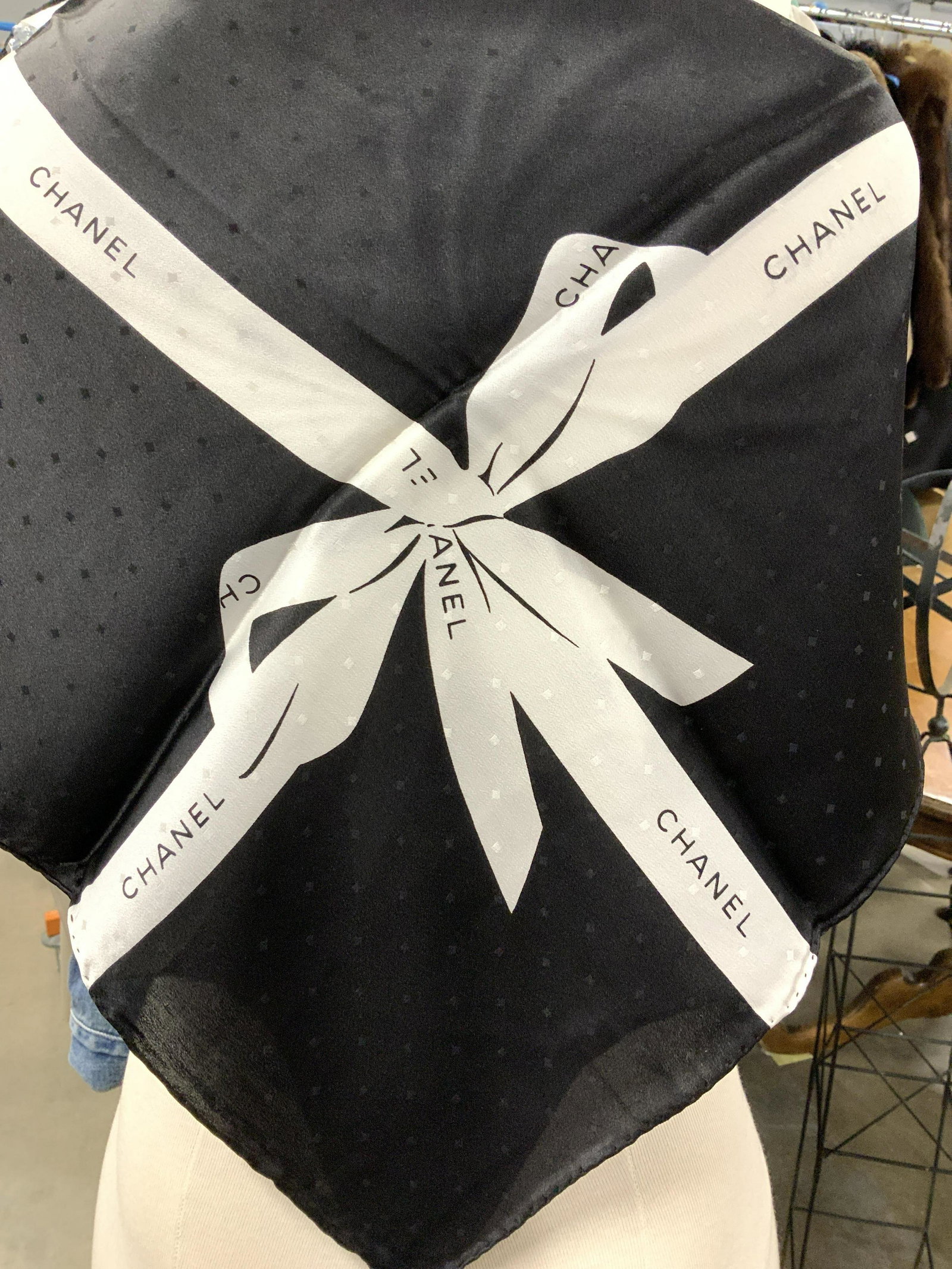 CHANEL Hand Rolled Silk Scarf NIP, Italy: Luxury CHANEL Black and White Silk Square Scarf, Hand rolled, 33.5 x 34 in. Design includes 4 corner white Chanel ribbon on black background with and subtle tonal polka dots. New in package and only r