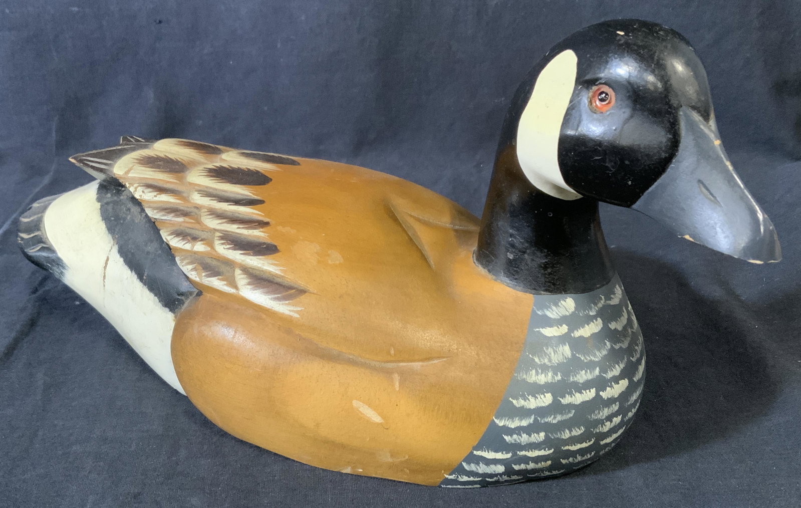 Hand Painted Wooden Duck Sculpture, Taiwan: Hand painted Duck Sculpture, possibly vintage. Chipping present on underside of Bill. Label on underside reads as Made in Taiwan. Wear is consistent with age and use, evident surface wear. Measures ap