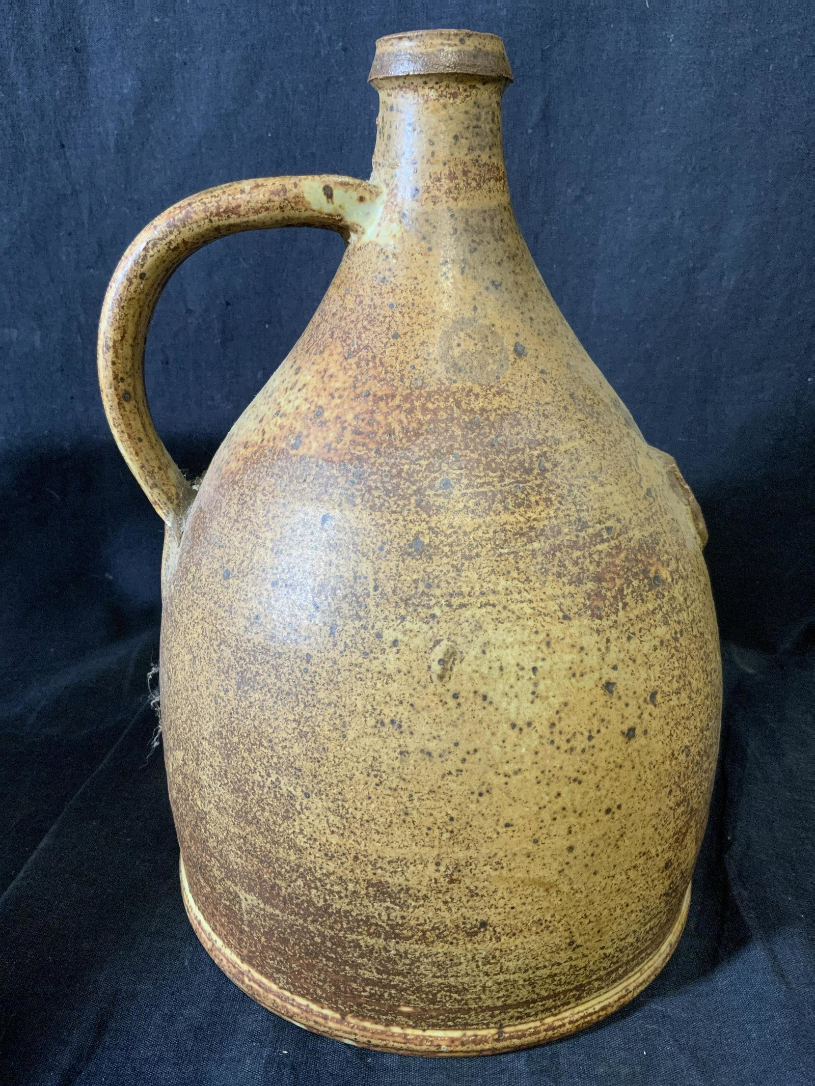 DIGRAZIA VINEYARD Custom Earthenware Wine Jug: DIGRAZIA VINEYARDS Earthenware Jug. Rust toned glaze. Wear is consistent with age and use. Property of a Fairfield County Connecticut Winery. Measures approx 10.25inches H and 7.5 inches W. Earthenwar
