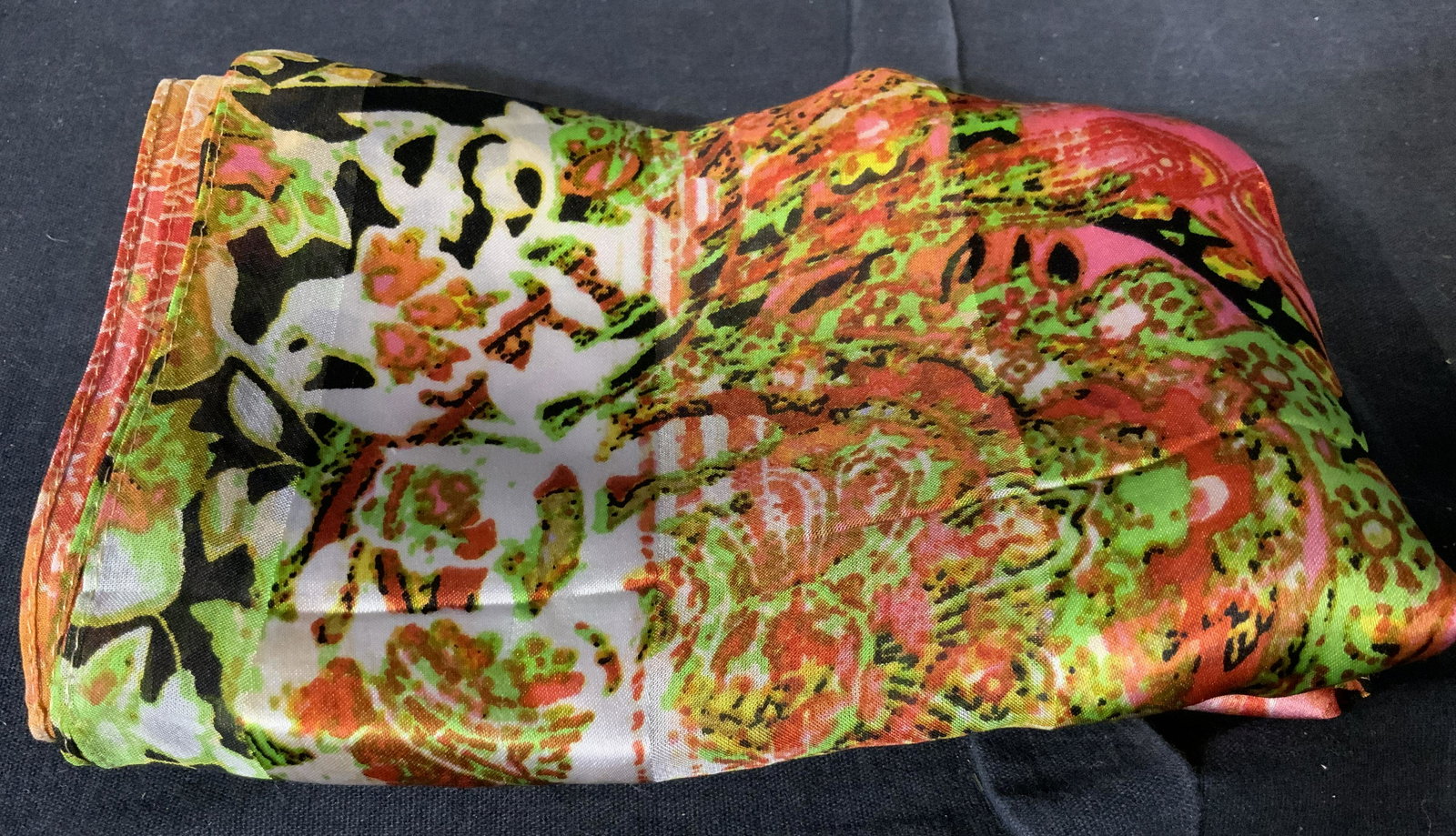 Cynthia Rowley Silk Scarf: Cynthia Rowley silk scarf, tags to scarf read ‘Cynthia Rowley’ and ‘100% Silk’, scarf is colored a series of pinks with various patterns throughout, scarf measures 67 inches long, Cynthia Rowl