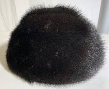 MACYS LITTLE SHOP Mink Fur Hat: Tag on interior reads MACYS LITTLE SHOP. Piece appears to be dark chocolate toned. Interior crown area has crocheted detail. Piece measures approx 8 inches wide 5.5 inches tall. Hat, fur hat, women’