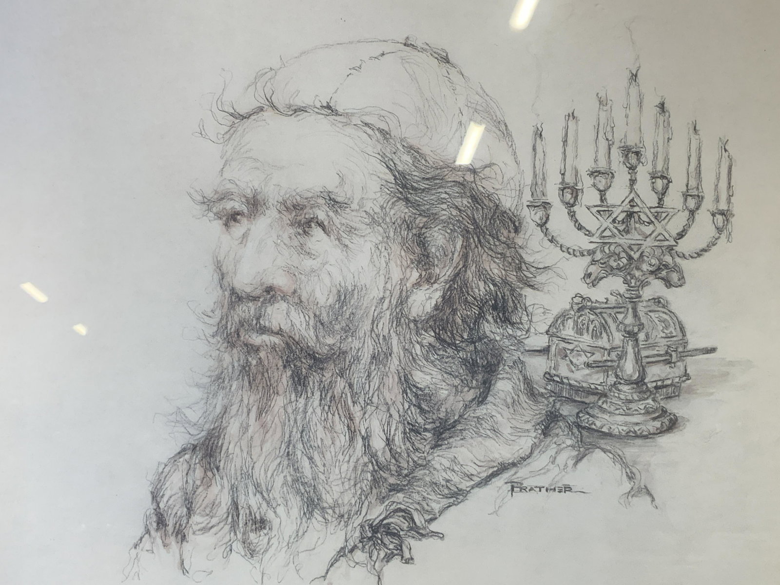 Signed Judaica Pencil Illustration: Signed Judaica pencil illustration, signature to the lower right corner possibly reads ‘Prather’, subject a bearded man standing in front of a menorah and Torah box, gilt wood and black painted fr