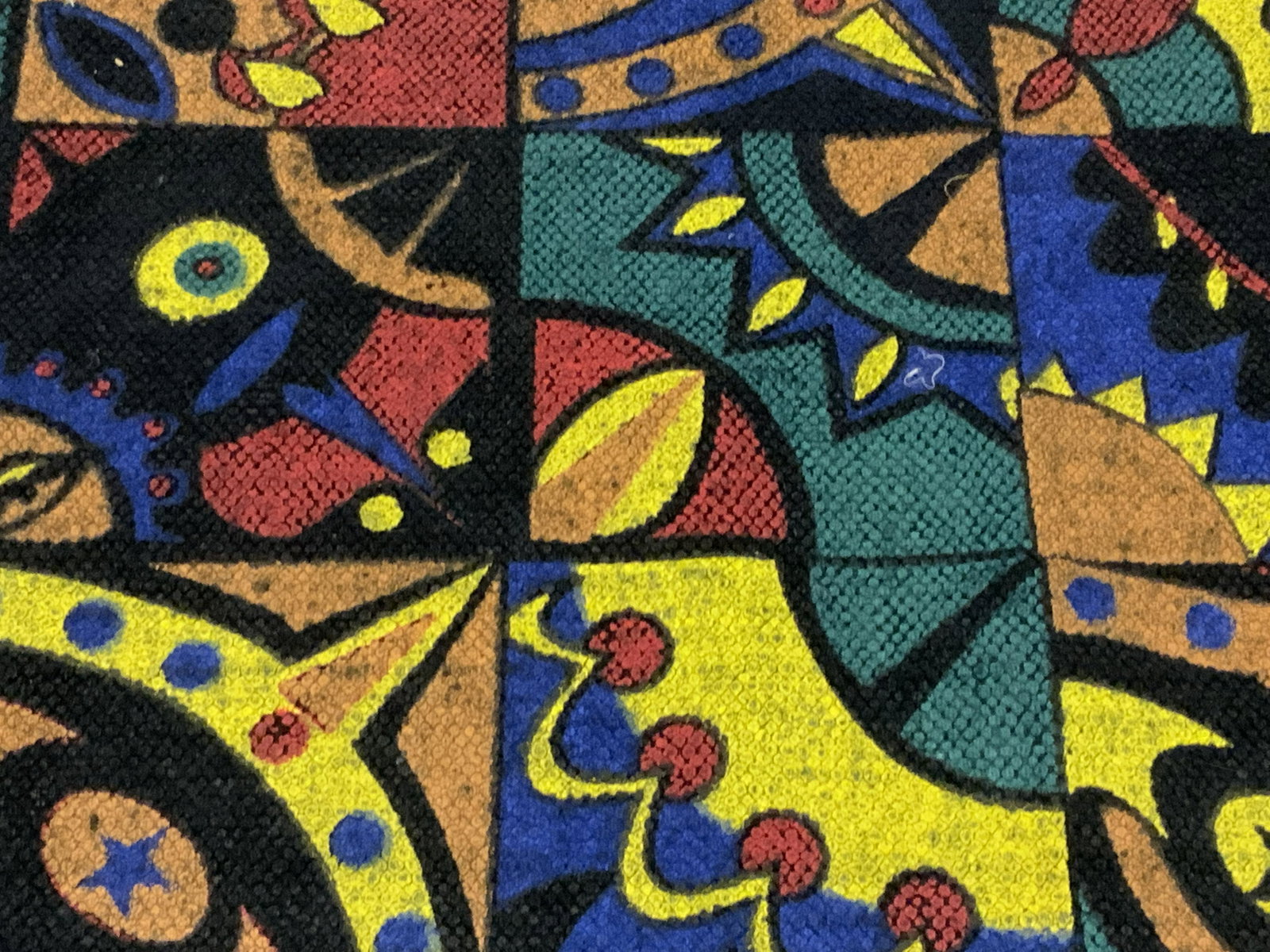 Abstract Patterned Tapestry Rug: A black tasseled rug / tapestry. The piece features a colorful abstract pattern in the center and tassels along the edges. Measures Approx. 22L x 33W in. Piece has wear consistent with use. Area rug, 