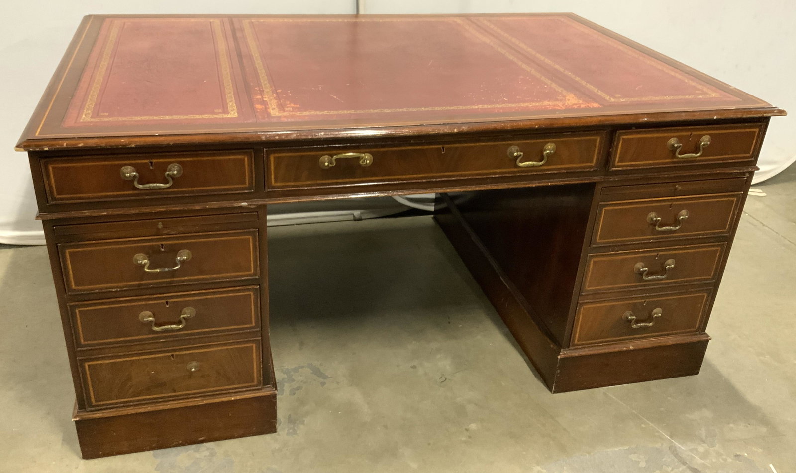 Antique Wooden Partners Desk: Desk has bottom lower area open to allow for 2 chairs to sit facing each other. Desk is antique. Piece has separate top which sits on drawer areas. In total, desk has 9 drawers, one extends from deskt