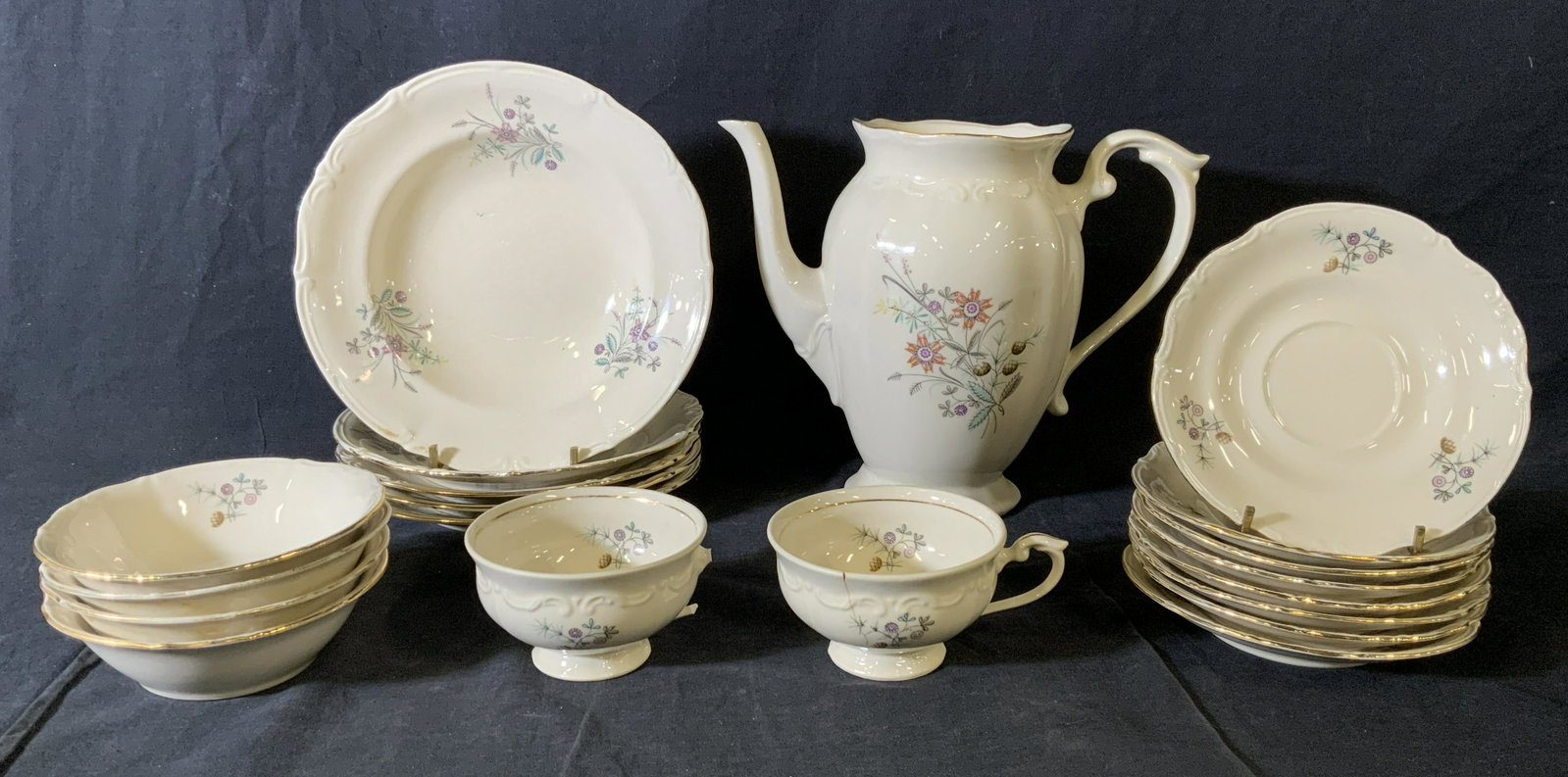Set 20 Vintage PT TULOWICE Porcelain Dinnerware: Set 20 Vintage PT TULOWICE Porcelain Dinnerware, stamps read ‘PT TULOWICE Made in Poland’, saucers measure 5 7/8 inches in diameter, teacups measure 2 3/8 inches tall x 4 7/8 inches wide, teapot m