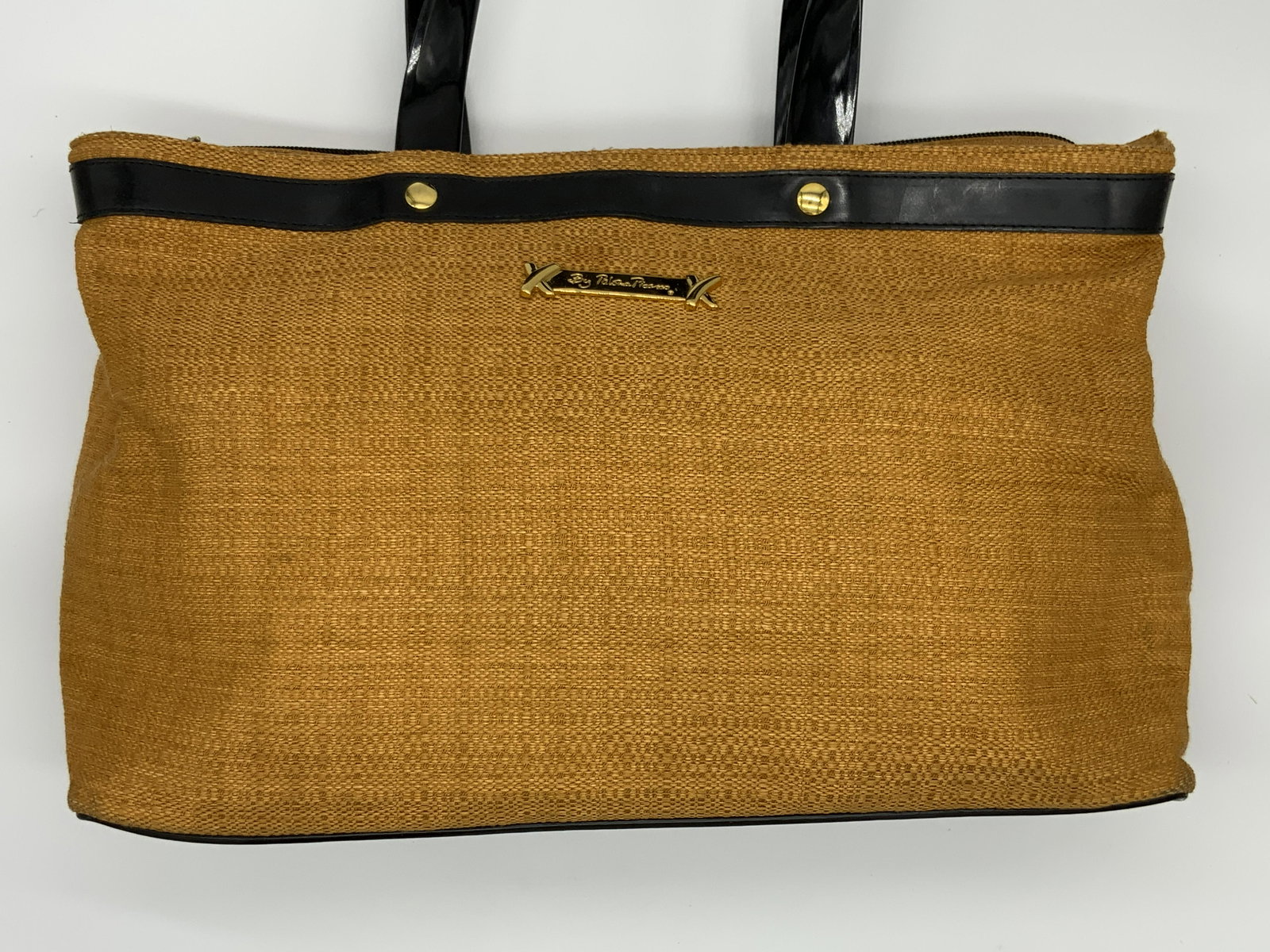 PALOMA PICASSO Tote Bag: PALOMA PICASSO Tote Bag, inscriptions read ‘By Paloma Picasso’, straw textured bag with gold toned hardware and leather accents, measures 10 x 15 5/8 inches, drop measures 11 1/4 inches, surface w