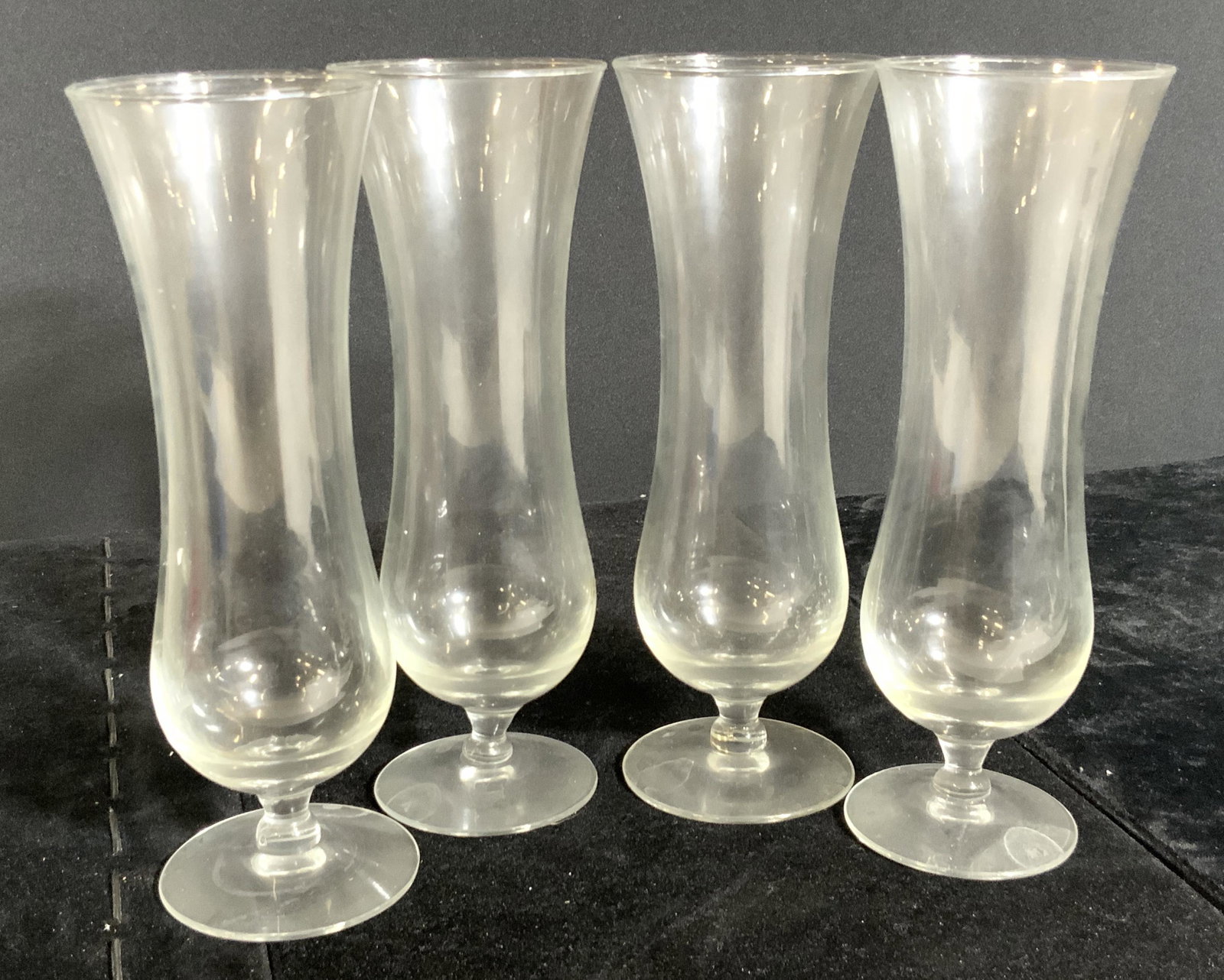 Set 4 Glass Champagne Flutes, Barware: Four clear glass champagne flutes. Pieces measure approx. 7H x 2W in. Glassware, Barware, champagne flutes, champagne glasses, homewares, collectibles, table setting, drinkware, glasses, kitchenware,