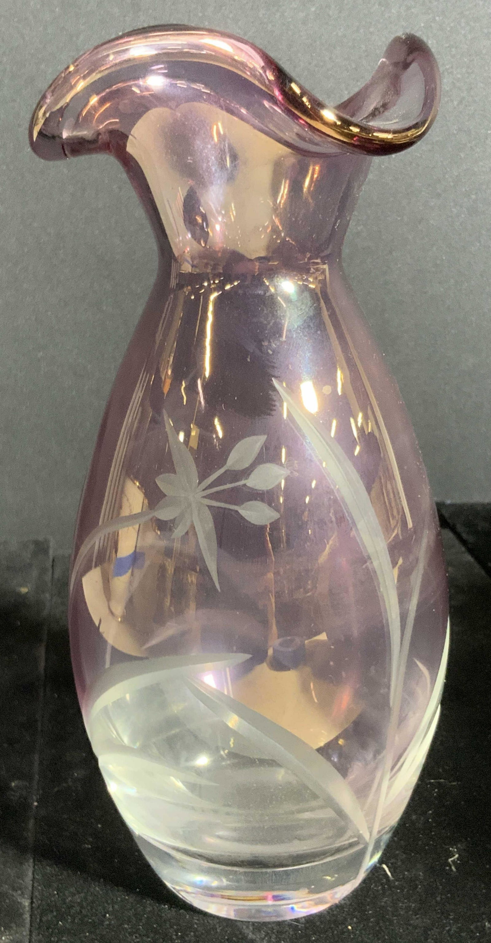 LENOX Signed Purple Ombré Art Glass Table Vase: A amethyst hued ombré art glass vase decorated with frosted glass florals. The frosted glass features etched accents. The rim of the vase is ruffled. The underside is signed Lenox. Approx. 9H x 4W in