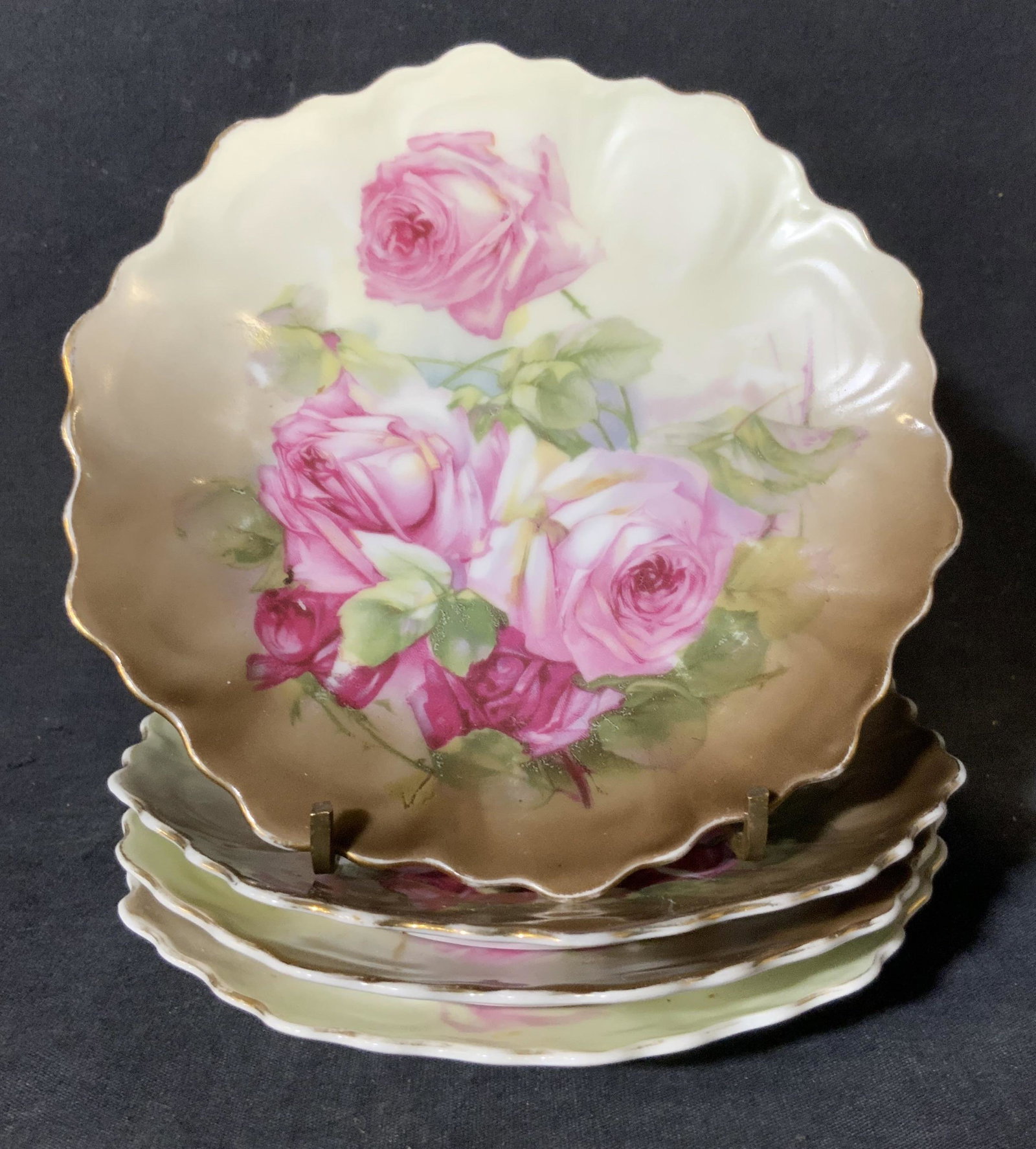 Set of 4 Z S & CO Porcelain Plates: Set of 4 Z S & CO Porcelain Saucers / plates, stamp to base reads ‘punch Z.S. & CO BAVARIA’, pattern features pink and yellow roses, all measures 6 1/4 inches in diameter, surface wear and chips t