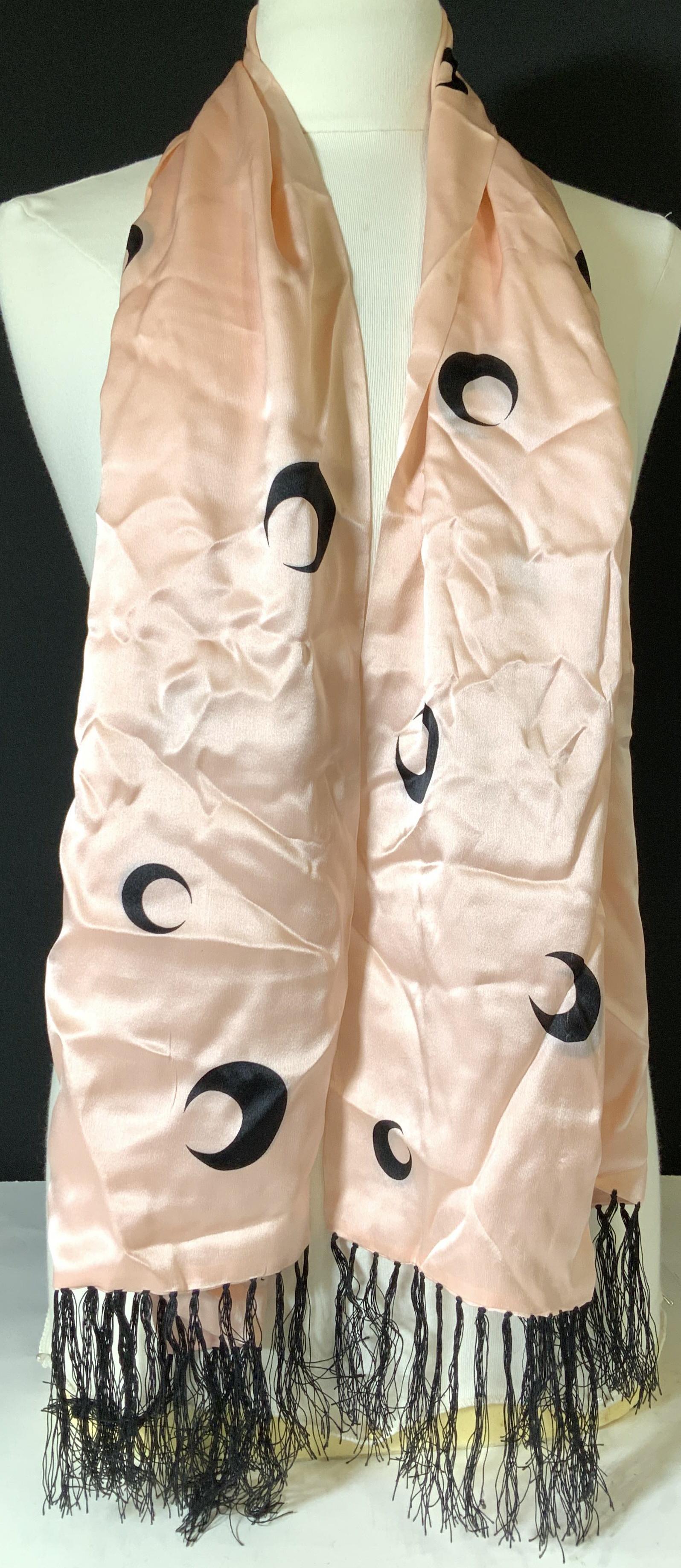 PERRY ELLIS Pink Silk Moon Scarf, Signed: 15 x 56 in. pink silk scarf with end tassels and crescent moon pattern. PERRY ELLIS Hallmarked on one end. Vintage. Couple thread pulls and spots consistent with use & age. Scarf, Perry Ellis, Silk Sc