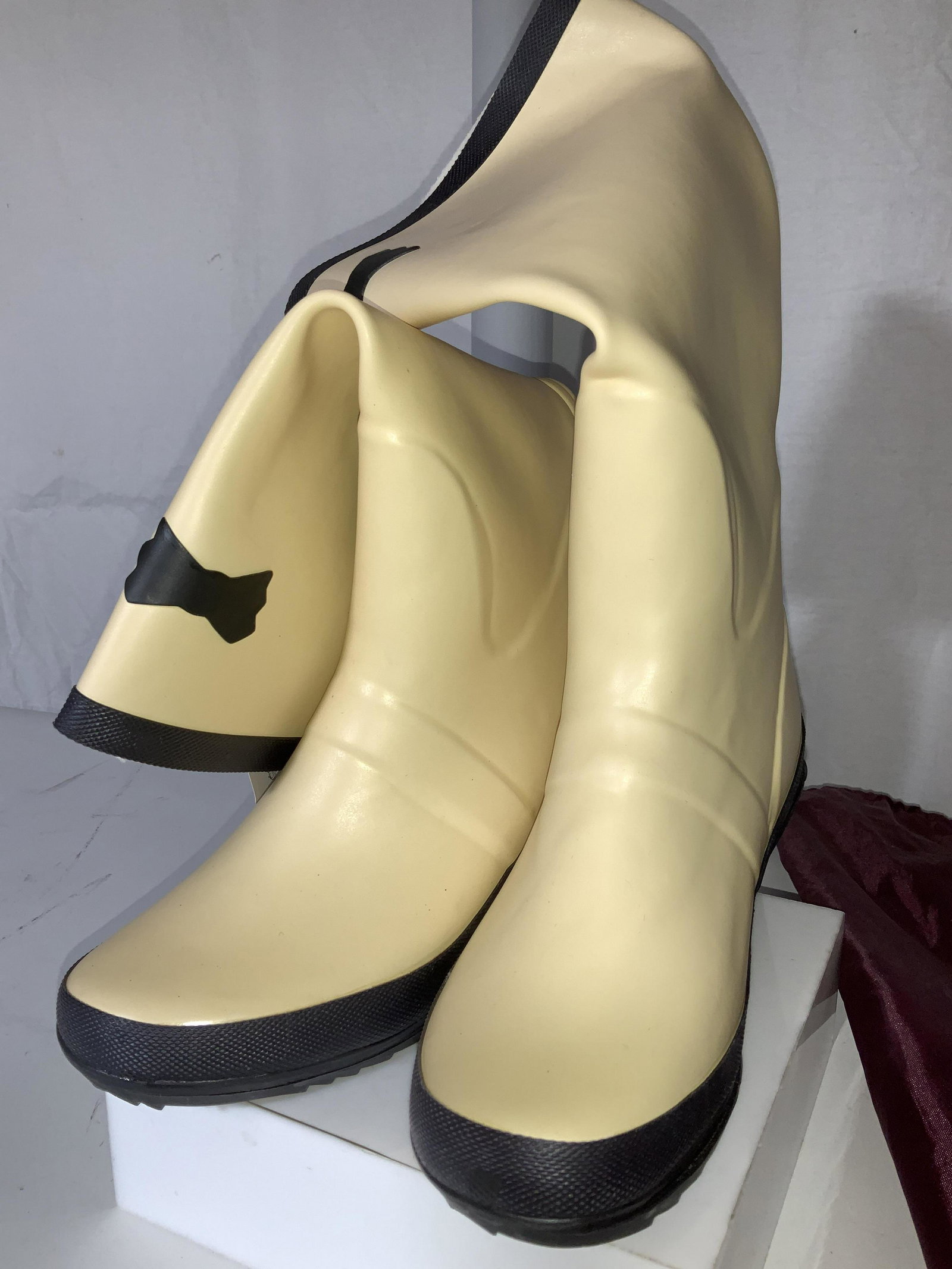 Hopeless Romantic Never Worn Rubber Boots: Rain boots, Rubber latex with cotton lining, Size 8, Light Saffron with black heels, heel raise 2.25 in. Original tag attached to one boot. Total ht 15.5 in. Comes in duster bag. Hopeless Romantic Rai