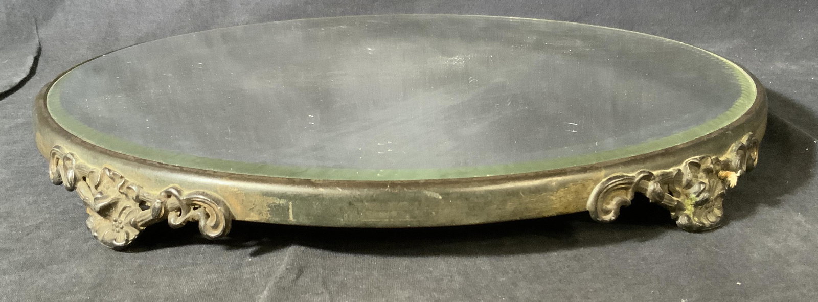 Mirrored Wooden Vanity Tray: Mirrored Wooden Vanity Tray, no apparent inscriptions or marks, measures 1 1/4 inches tall x 14 1/4 inches in diameter, surface wear to piece, tarnishing to metal, Mirrored tray, vanity tray, decorati