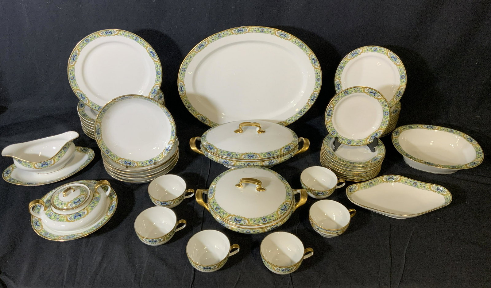 Set of 47 LIMOGES Porcelain Dinnerware: Set of 47 LIMOGES Porcelain Dinnerware, inscriptions reads ‘ Limoges Elite France’, floral design to borders of dishes, teacups measures 2 inches tall x 4 1/4 inches at widest point, saucers measu