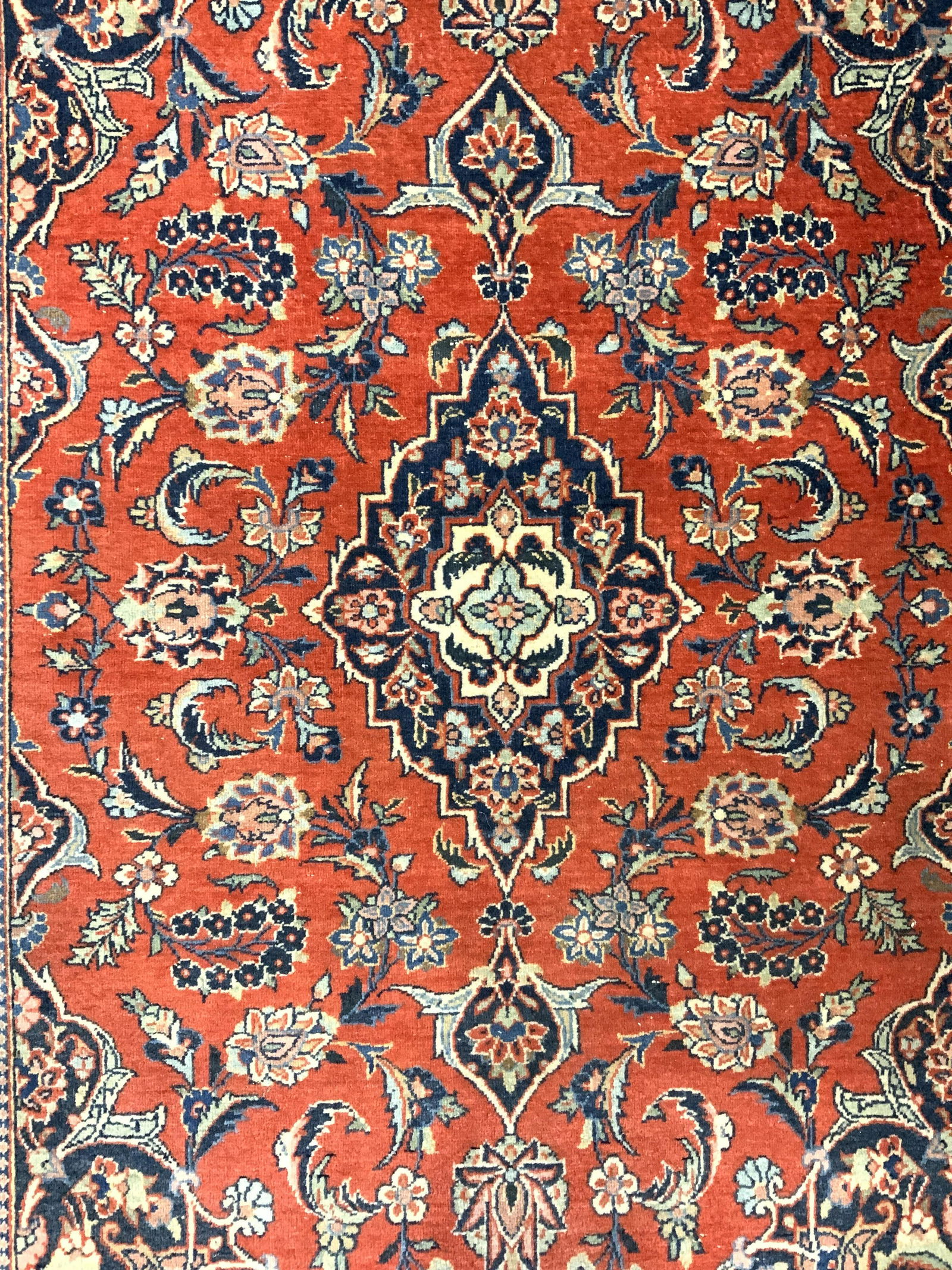 Vintage Handmade Persian Wool Rug: Rug is handmade and wool. Piece is vintage possibly antique. Rug has intricate multi toned floral, vine, leaf & geometric detail. Piece measures approx 62 inches long 42 inches wide. Rug, carpet, wool