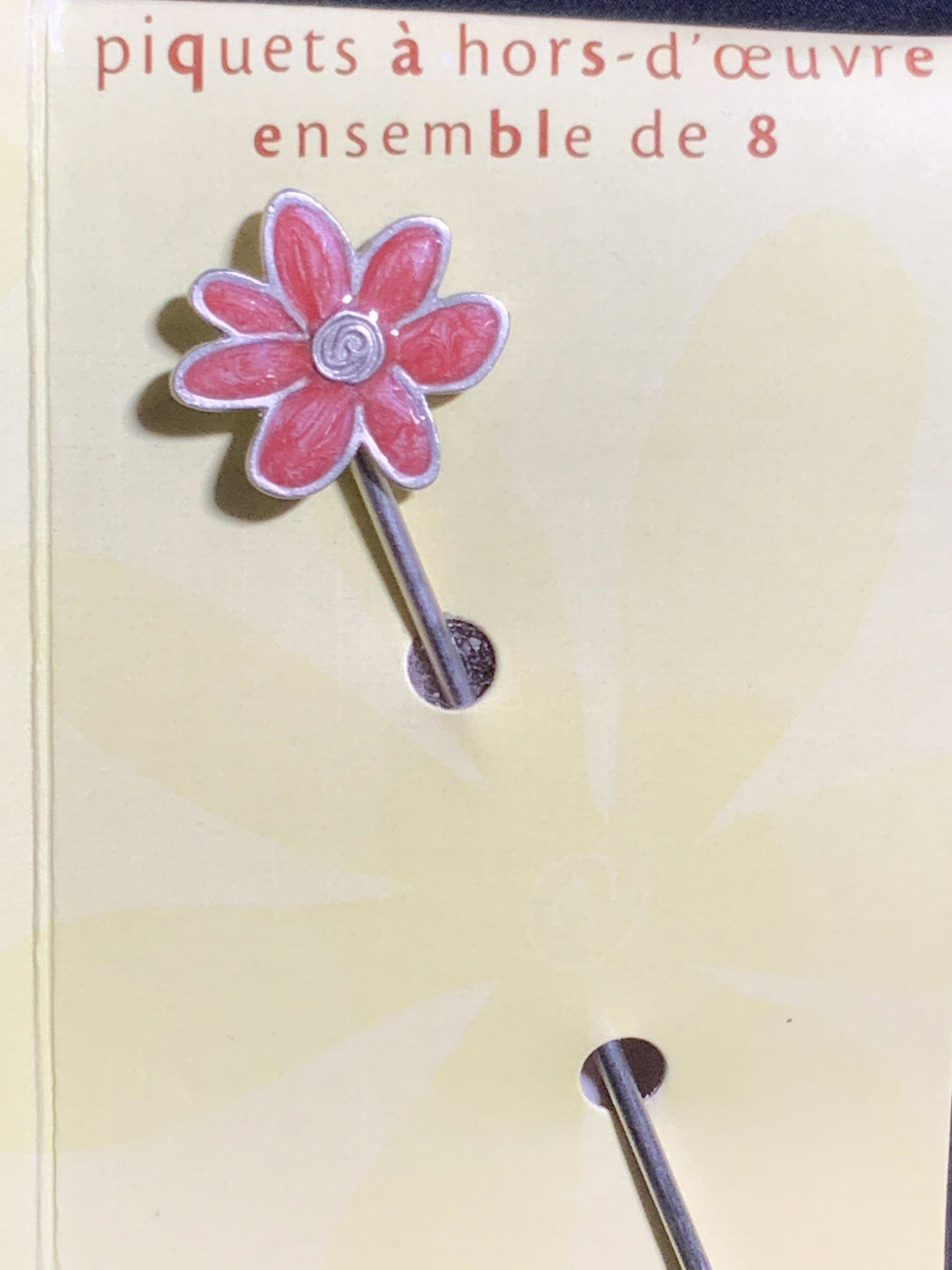Set 8 Enameled Hors d’oeuvres Picks, Org Packaging: A set of eight enameled Hors d’oeuvres Picks / Appetizer Picks. Pieces are metal crafted to hearts, florals, and leaves. One end features the enameled accent, the other features the two-pronged pick