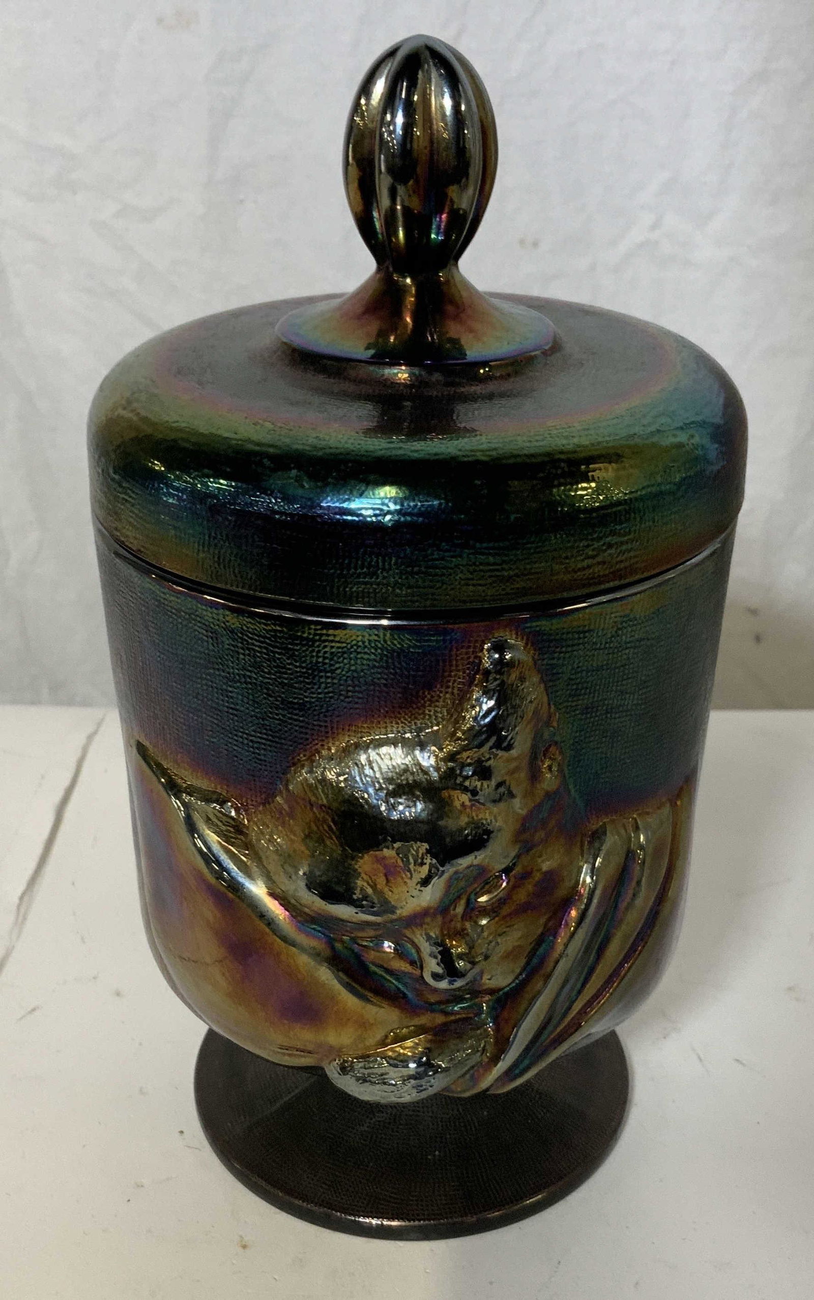 FENTON Carnival Glass Cat Candy Jar: FENTON GLASS ART Carnival Glass Candy Jar, iridescent glass, inscriptions to base read ‘December 1970 Cheshire by Fenton’, measures 8 1/2 inches tall x 5 inches in diameter, surface wear to piece,