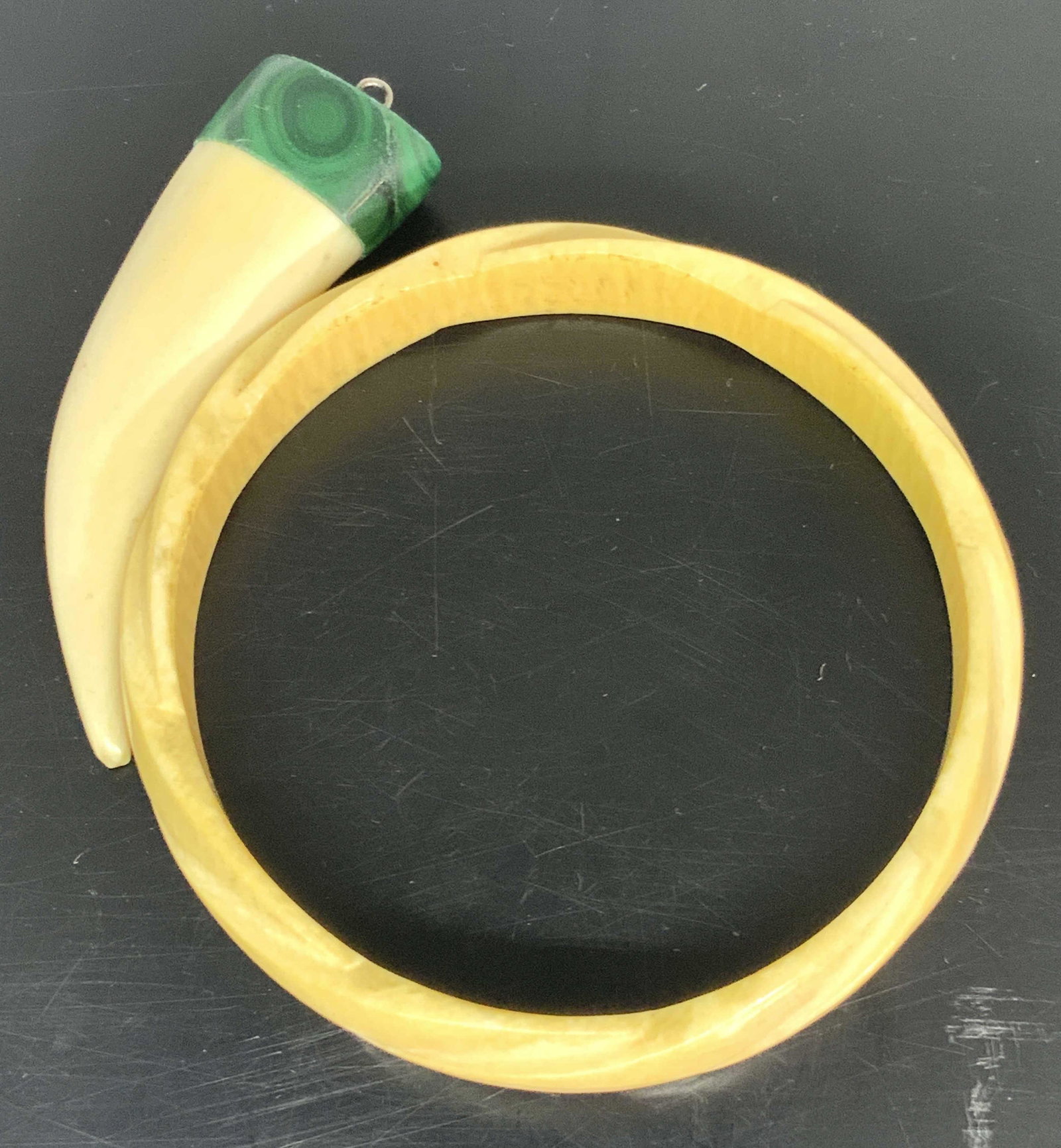 2p Carved Bone Style Bracelet & Malachite Pendant: One carved and polished bone style bracelet, one carved and polished bone style horn with malachite style accent. Pieces appear to be carved from composite material that resembles bone. The horn penda