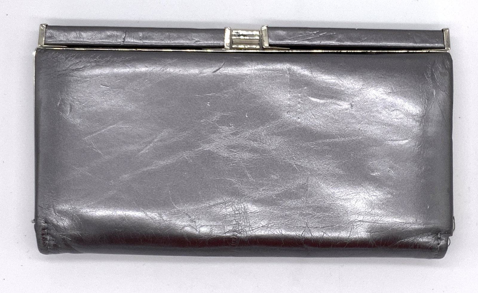 CHADWICK’S Women’s Clutch: CHADWICK’S Women’s Clutch, labels read ‘Chadwick’s Outer Shell: All man made materials Interfacing: 100% cotton’, measures 5 1/4 x 9 1/2 inches, surface wear to clutch, Chadwick’s, women��
