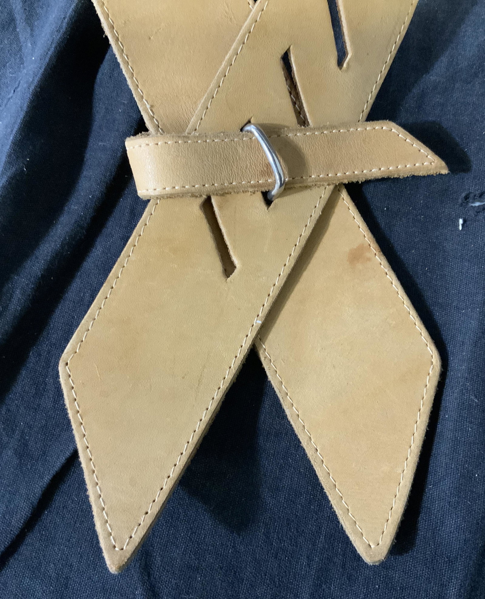 Women’s Tan Angled Belt: Women’s Tan Angled Belt, markings to reverse read ‘top grain cowhide’, measures 42 inches in length x 1 3/4 inches in width, wear and aging to leather consistent with age and use, Women’s tan 