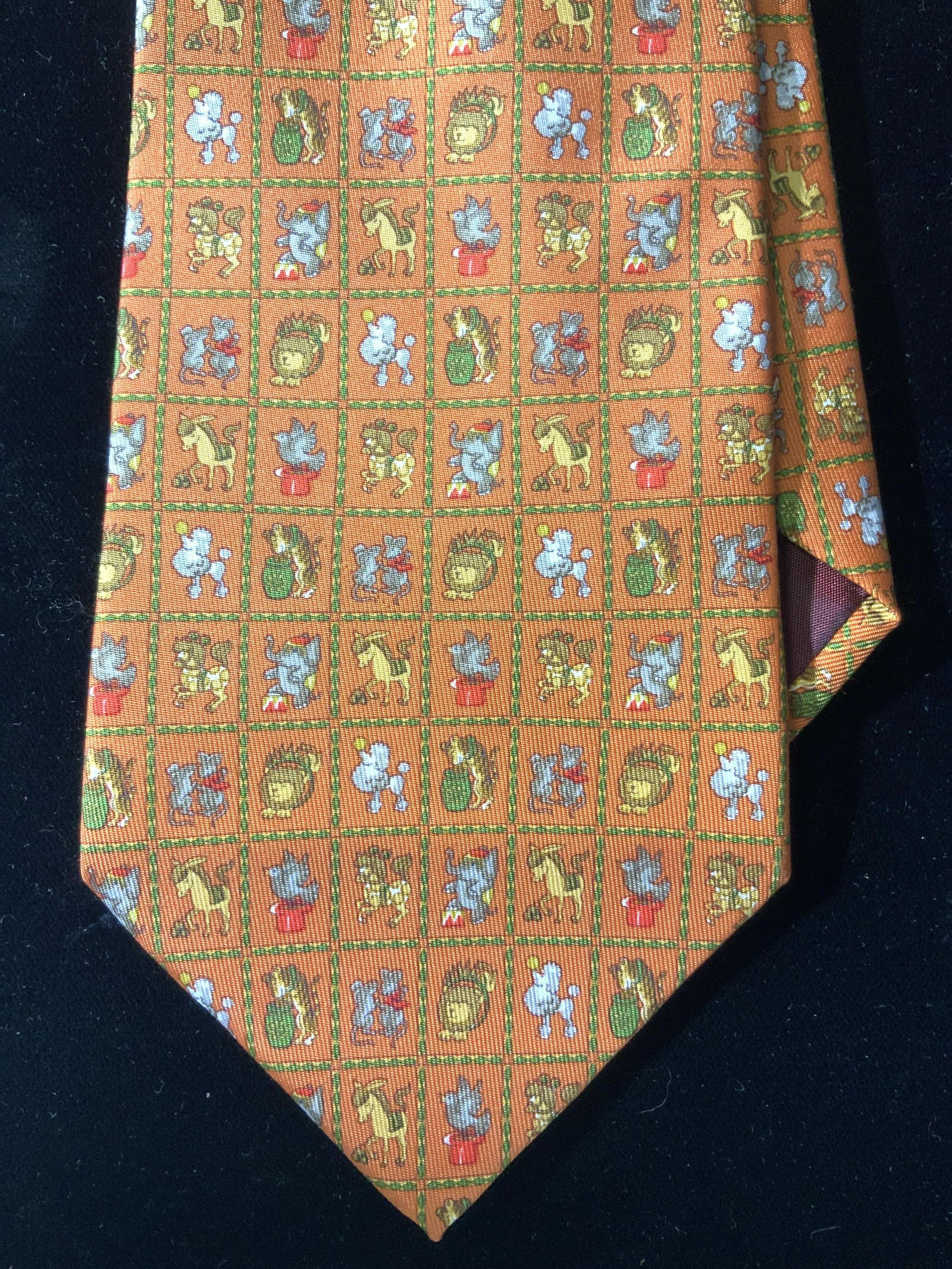 Salvatore FERRAGAMO Toy Animal Silk Scarf: Men’s Shirt Scarf, Made in Italy, Luxury Brand Salvatore Ferragamo, Orange Silk with Toy Animals lion, poodle, horse, mice, dove. 59 in long. Signed label on tie. Men’s Silk Tie, Italian Designer