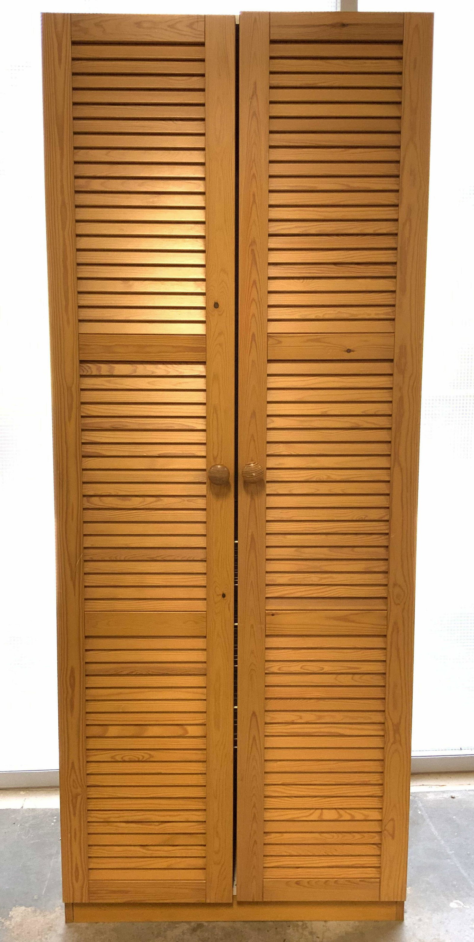 Vintage Wooden Pantry Storage Cabinet: Piece appears to be vintage. Cabinet has 3 white pull out metal storage drawers. Piece has 2 wooden knob style handles. Piece measures approx 77 inches tall 32 inches wide 24 inches deep. Pantry, cabi