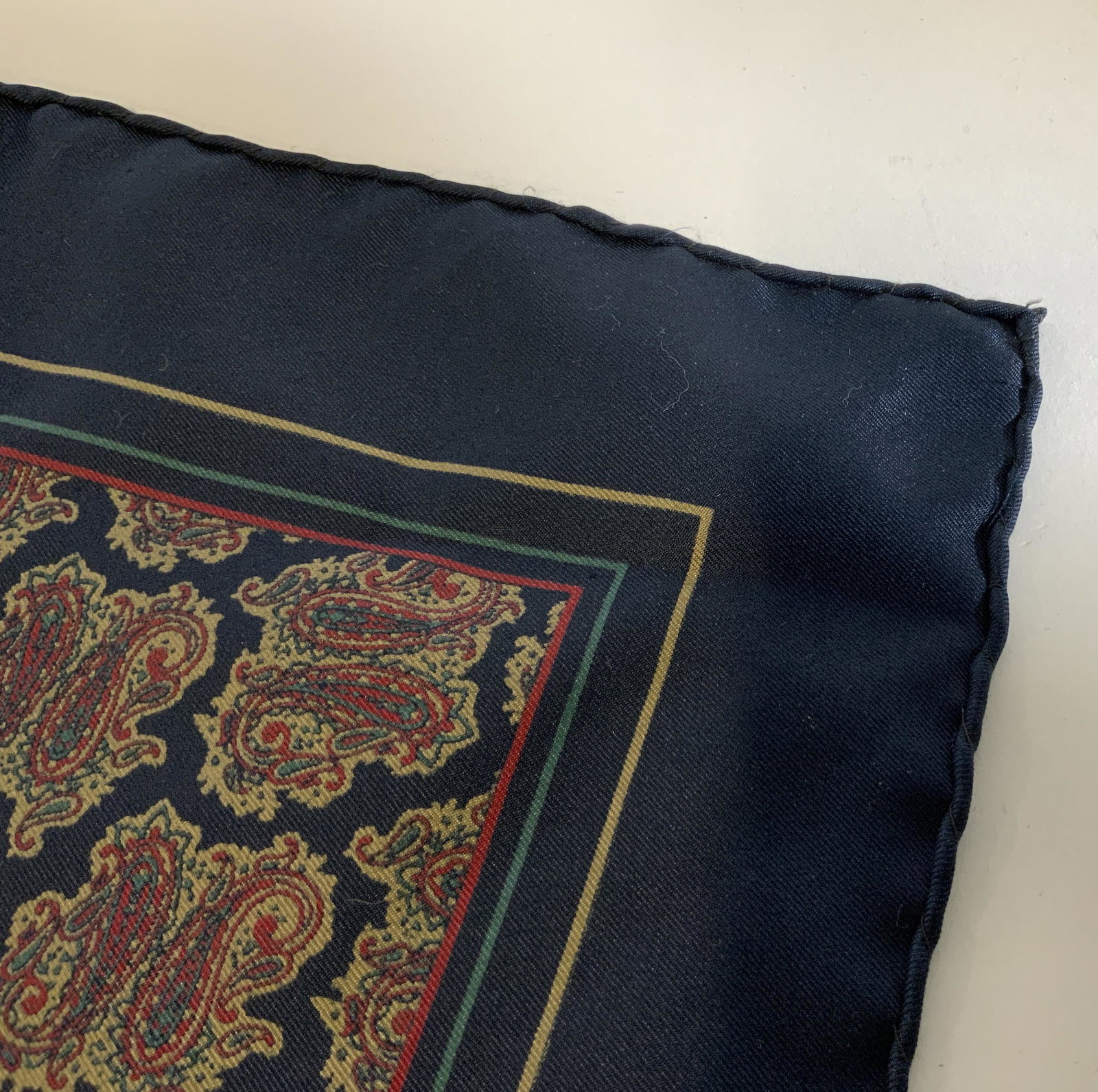 Paisley Print Handkerchief: Paisley Print Handkerchief, no apparent inscriptions or labels, paisley print with a blue border, measures 15 1/4 x 14 3/4 inches, loose threads to fabric, Handkerchief, kerchief, bandanna, textiles, 