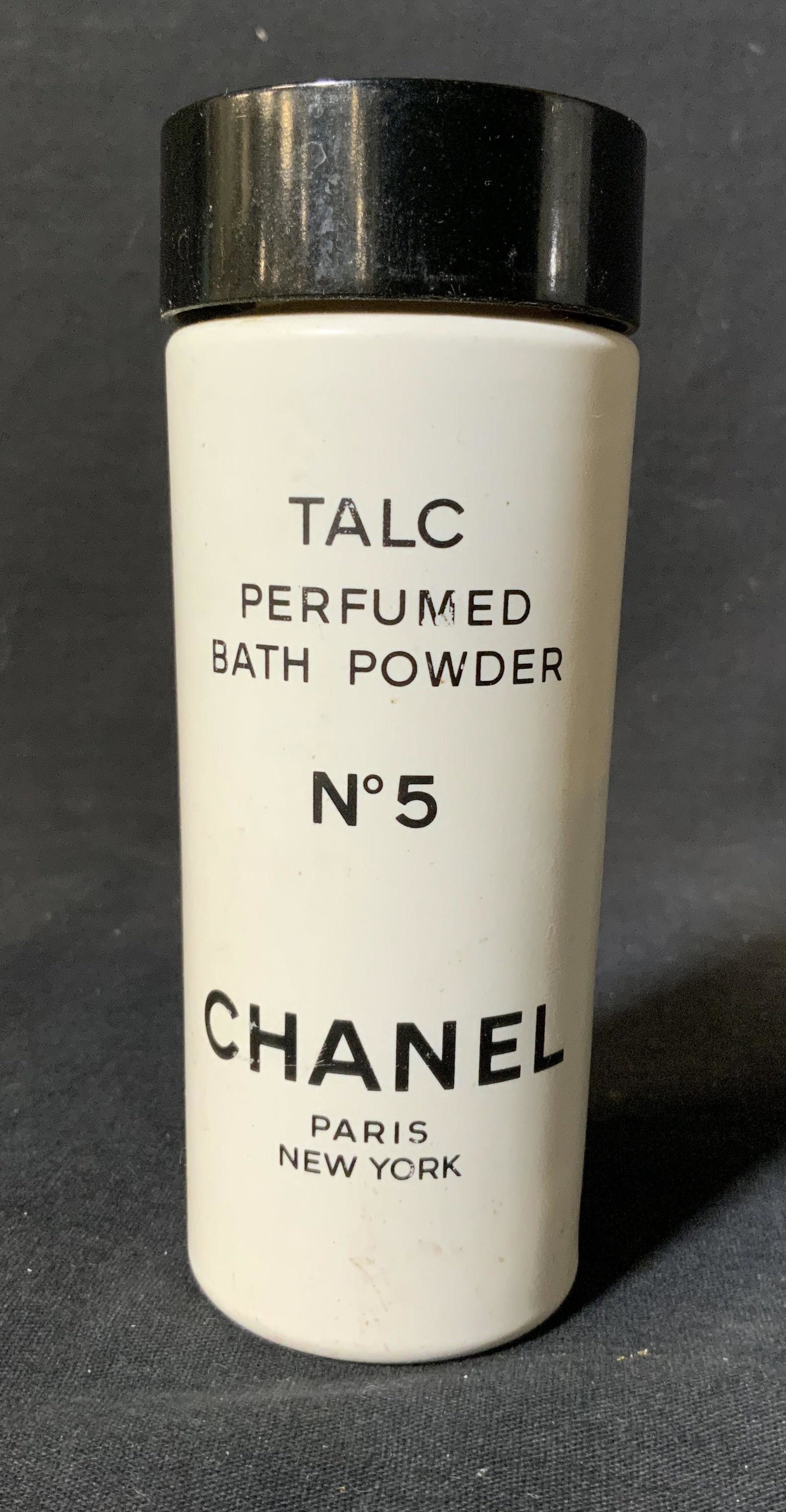 CHANEL Perfumed Bath Powder: CHANEL Perfumed Bath Powder, inscriptions read ‘Talc Perfumed Bath Powder’, measures 5 5/8 inches tall x 2 1/4 inches wide, surface wear to bottle, Chanel, Chanel number 5, bathroom accessory, bat
