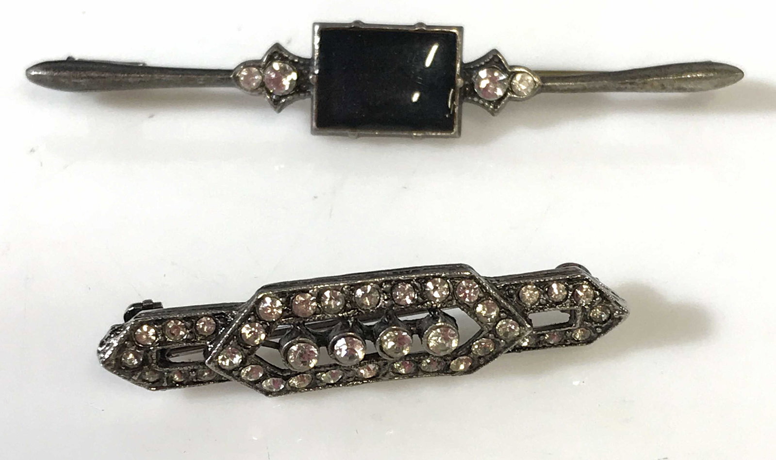 Vintage Art Deco Crystal Brooches in Velvet Box,: 2 pcs Antiqued Silver tone jewelry, one brooch with black enamel flanked by crystal solitaire. 2.5 in long. Multi crystal angular pin in antiqued silver tone. 1.5 in long. Art Deco Pins, Art Deco Broo