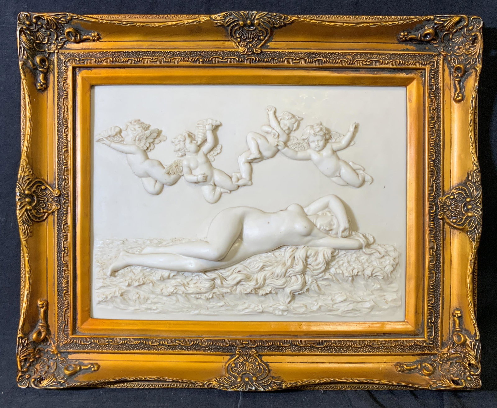 White Stone Relief of The Birth of Venus: White stone relief of The Birth of Venus, no apparent inscriptions or markings, relief depicts most of Cabanel’s The Birth of Venus, framed in a bright Orange gold painted wooden frame, measures 17.