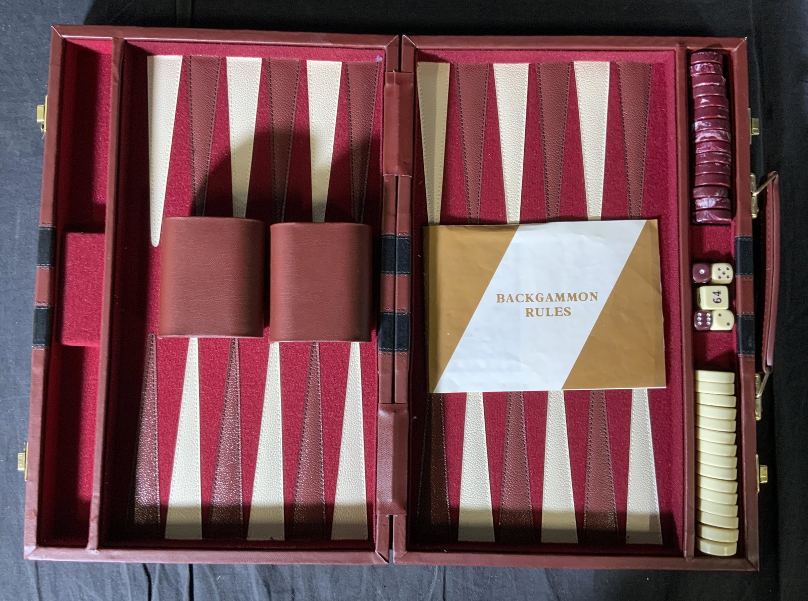 APEX Backgammon Set: APEX Backgammon Set, inscription reads ‘Apex Made in Taiwan’, measures 10 x 15 1/8 inches, measures 15 x 20 1/8 inches when open, five dice, 30 pieces, surface wear to case, Apex, backgammon set, 