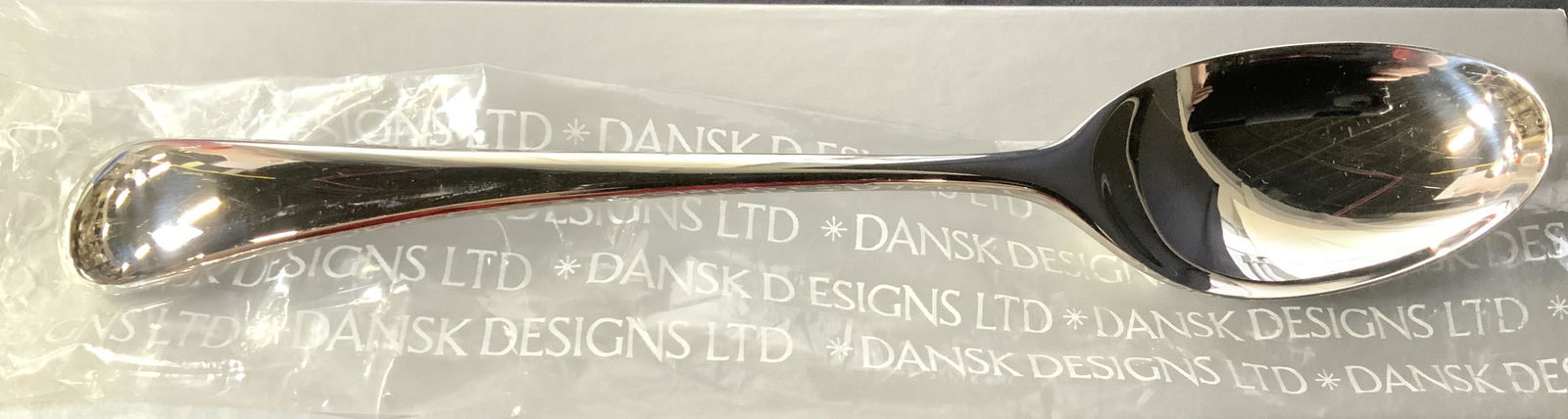 DANSK DESIGNS Long Handle Serving Spoon, Org Box: Dansk Designs International Ltd, Japan 10 in. Serving spoon. Possibly stainless steel, no metal mark, only maker’s mark. Comes in original package and box. Dansk Serving spoon, Giftware, Flatware, S