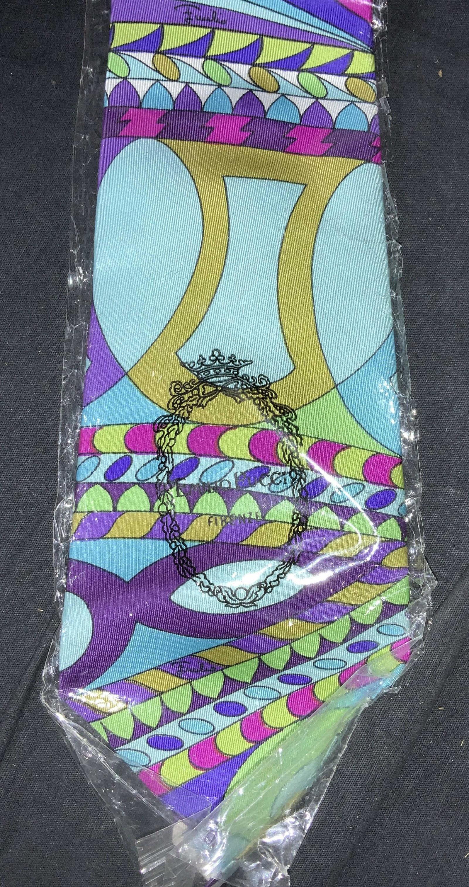 EMILIO PUCCI Signed Silk Pop Art Men’s Tie, NIP: Emilio Pucci New Never Used, in Original Packaging men’s Wide Silk Tie . Tag reads Ribot 98/A Via Veneto Roma. Pop Art Pattern, Classic Pucci, aqua, hot pink, purple, green. signed in Multiple locat