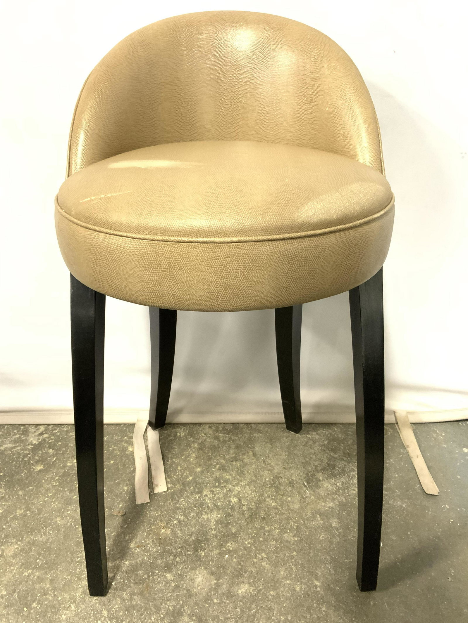 NINA CAMPBELL FURNITURE Leather Stool: Tag on underside reads NINA CAMPBELL FURNITURE. Piece is tone toned and appear to possibly be leather. Piece measures approx 33 inches tall 17 inches wide 20 inches deep. Stool, Nina Campbell stool, l