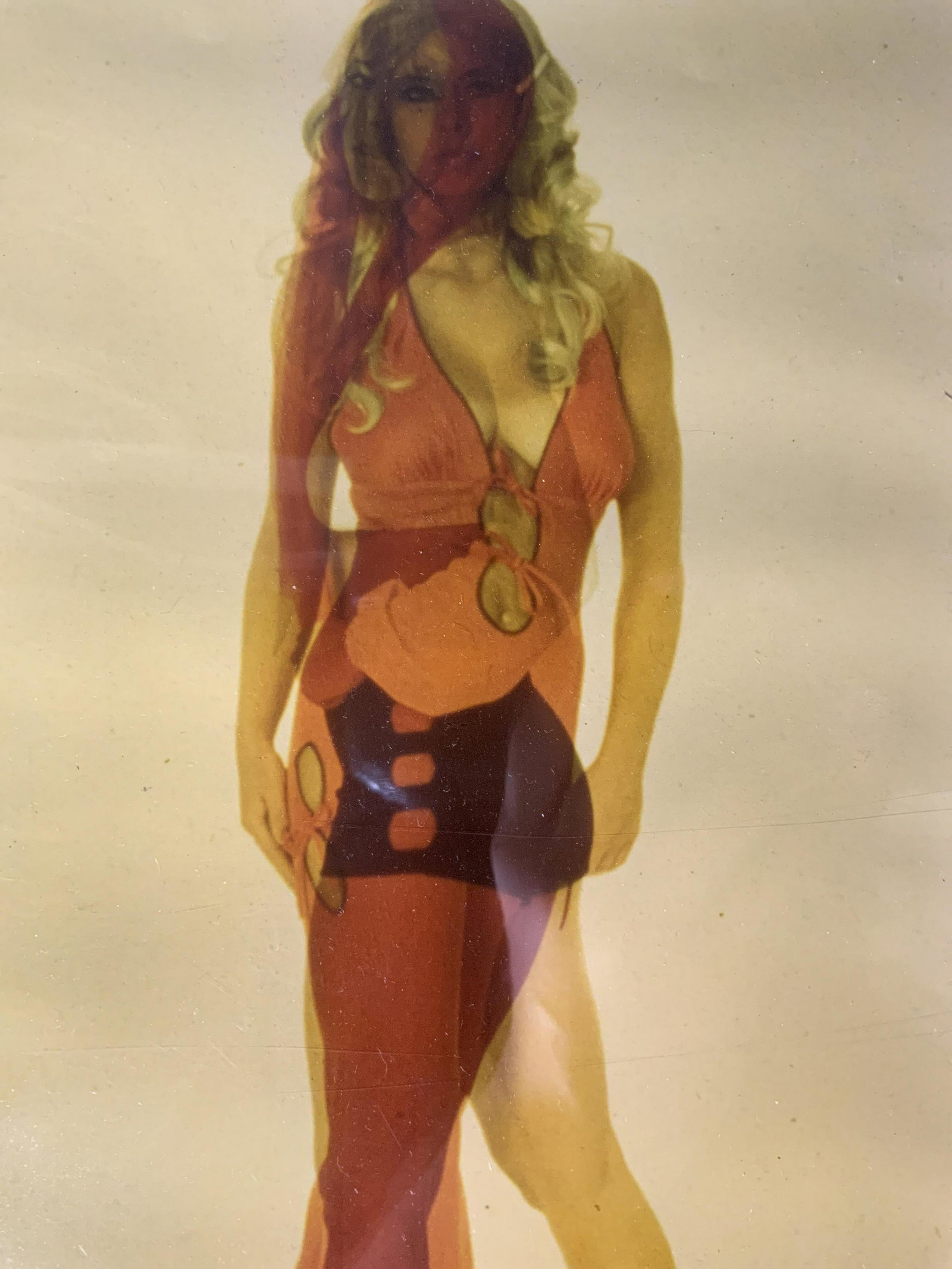Superimposed Photograph of Two Women: Superimposed Photograph of Two Women, subject a superimposed image of a woman in a jumpsuit and woman in shorts, measures 21 1/8 x 17 1/8 inches, black wooden frame, surface wear to frame, professiona