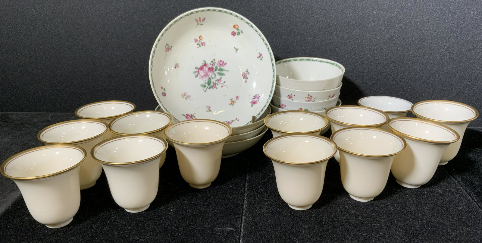 Group Lot Vintage Ceramics: Group lot 20 vintage ceramics. 12 tea cup inserts by LENOX. 4 bone china saucers 3 bone china cups, hand painted. Wear is consistent with age and use. Largest piece measures approx 5 inches in diamete