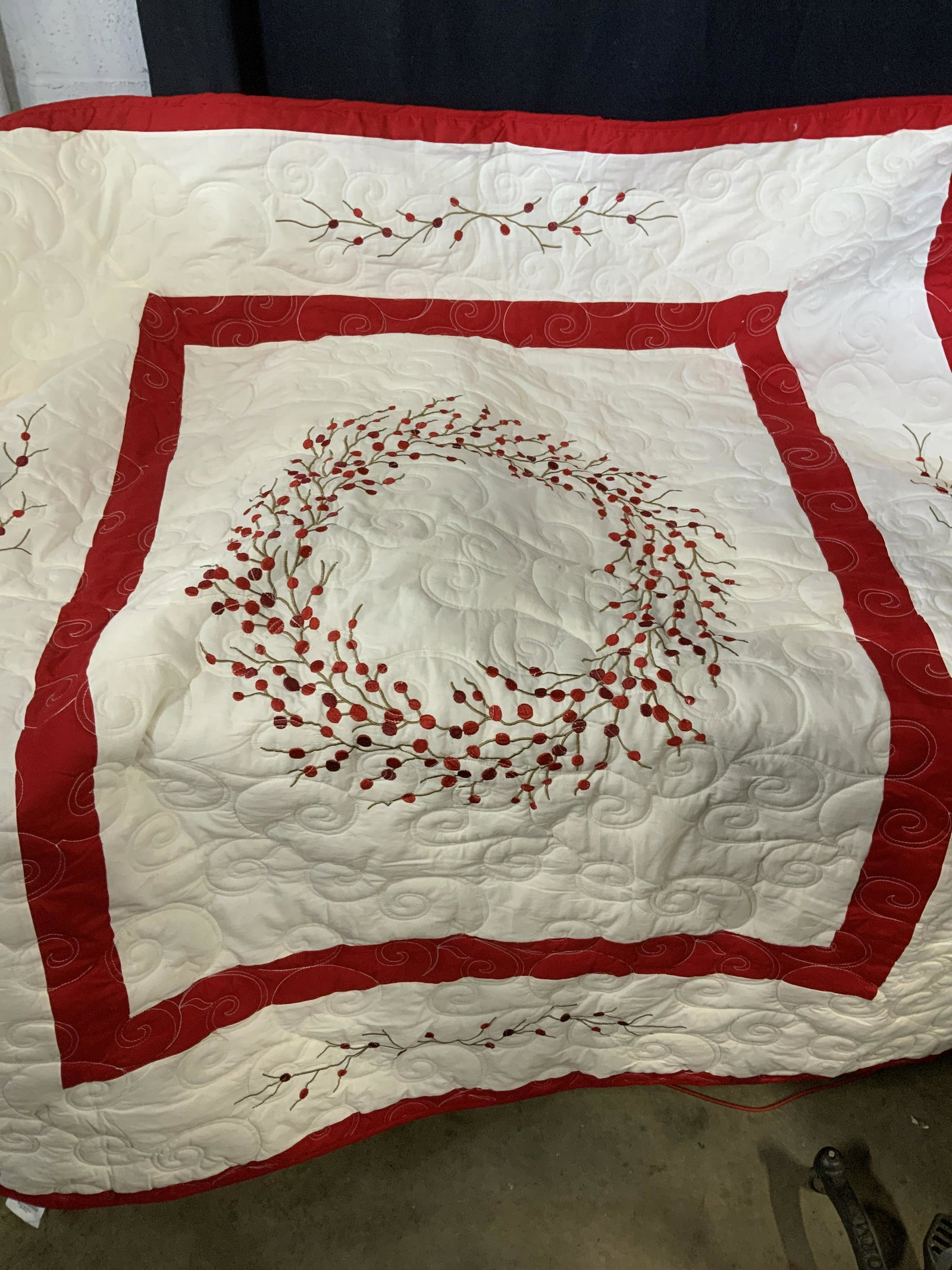Collectible Embroidered Berry Cotton Quilt Throw: An attractive Sandwich quilt with embroidered red fruit berries on tree branch. Scroll sandwich pattern, red border, Berry on branch center wreath. cotton frontside, polyester filling and backside fab