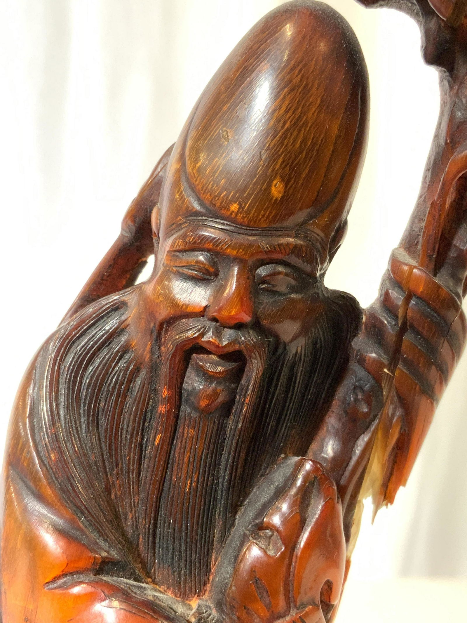 Vintage Resin Asian Elder Figure: Male figure appears to be resin possibly bone. Piece depicts an elderly male figure holding a shaft. Piece measures approx 9 inches tall 3.5 inches wide 2.5 inches deep. Resin figure, decorative acces