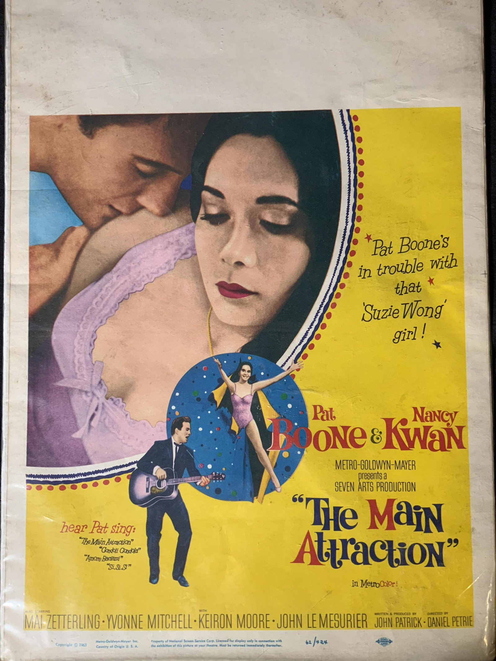 Vintage The Main Attraction Movie Poster: Vintage The Main Attraction Movie Poster, inscriptions read ‘Pat Boone’s in trouble with that Susie Wong girl! Pat Boone and Nancy Kwan’, ‘Metro Goldwyn Mayer presents a seven arts production 