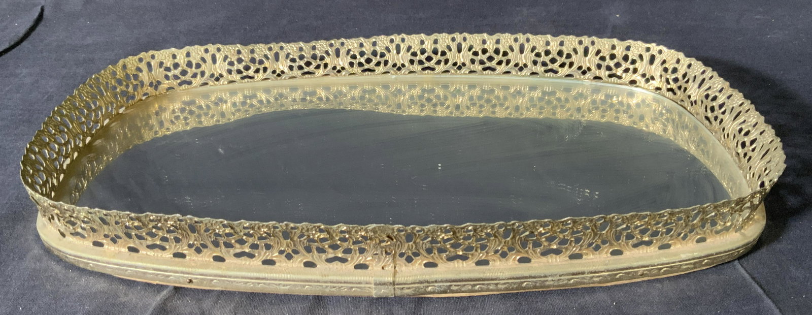 Mirrored Metal Vanity Tray: Mirrored Metal Vanity Tray, no apparent inscriptions or marks, measures 13 7/8 x 7 7/8 inches, 1 3/8 inches tall, surface wear to piece, slight bending to metal, Vanity tray, mirrored tray, vanity acc