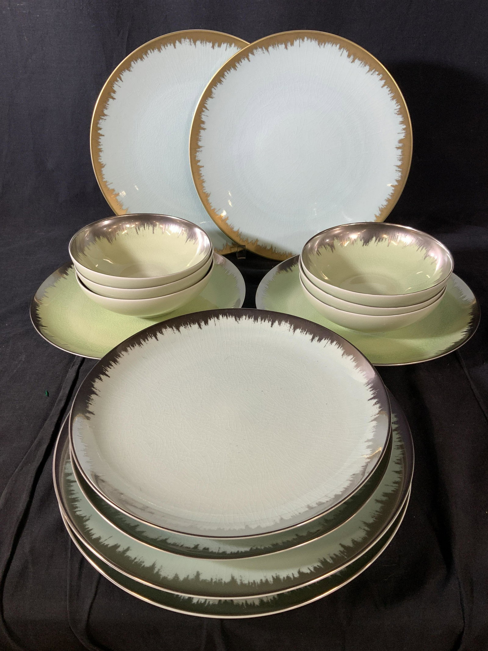Kim Seybert Shakti Porc. Bowls, Plates & Chargers: Total pieces 14. Eclectic Mix of Kim Seybert Luxury Shakti Porcelain Dinnerware with combination of 4 Chargers, 4 Dinner Plates and 6 Bowls. Includes both Colors of Spearmint and Seaglass with with ei