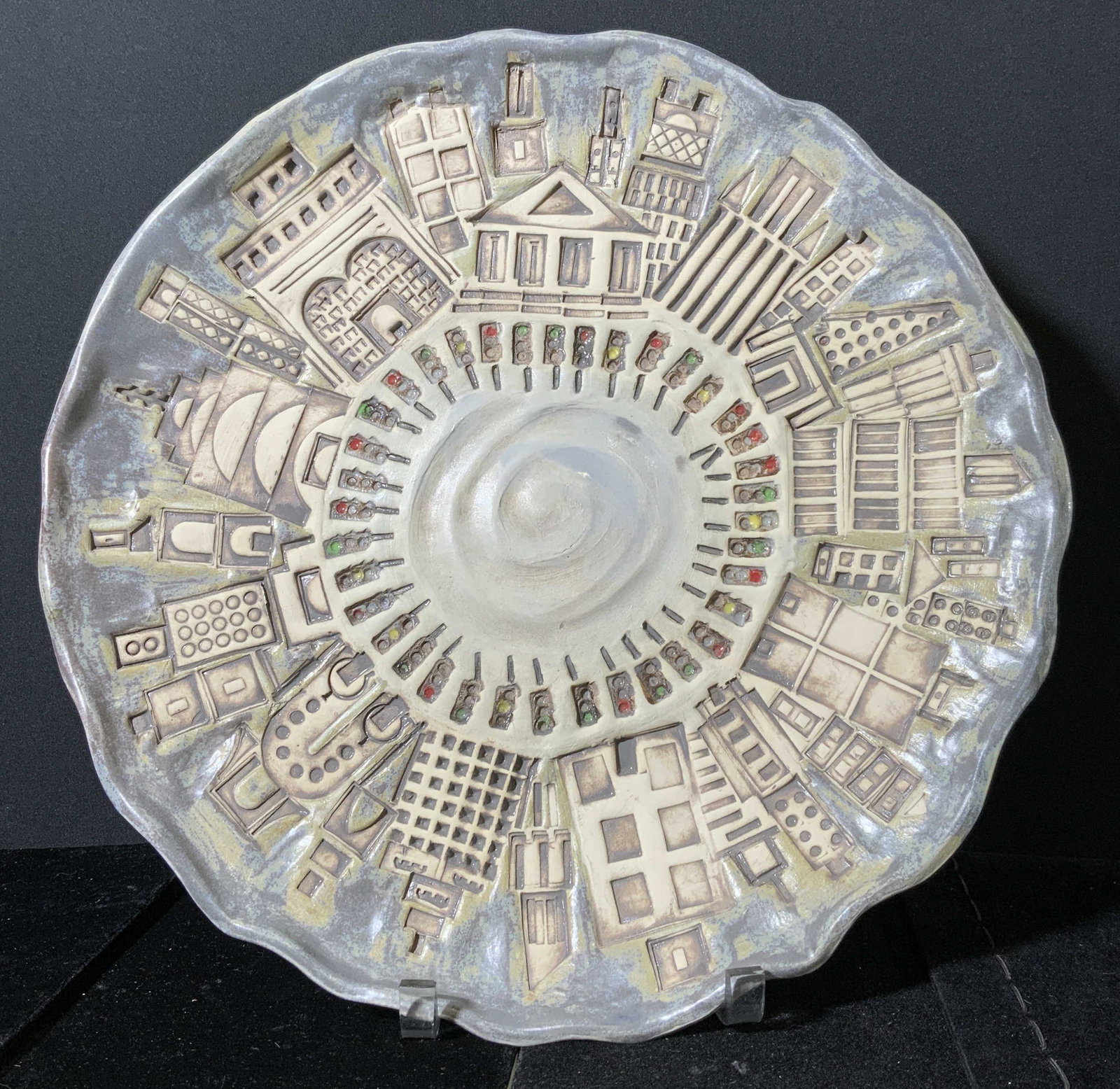 Signed DEBORA MELTZ Decorative Platter: Signed decorative plated. Lip is decorated with a city scape, well is decorated with traffic lights. Back is signed DEBORA MELTZ, 2007. Wear is consistent age and use. Measures approx 15.5 inches in d