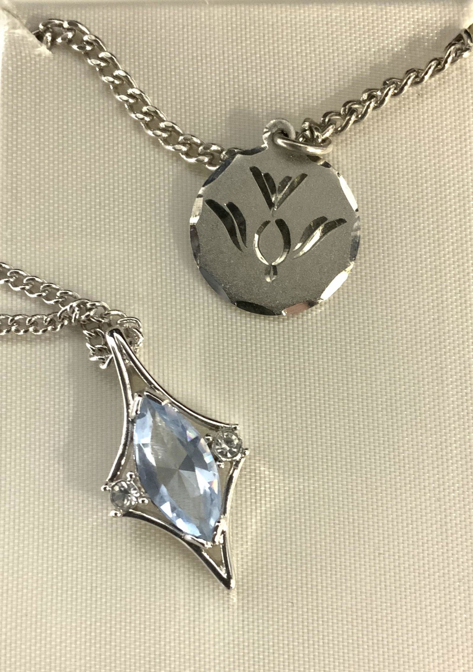 Lot 2 Silver toned pendant necklaces, Org box (1 of 3)