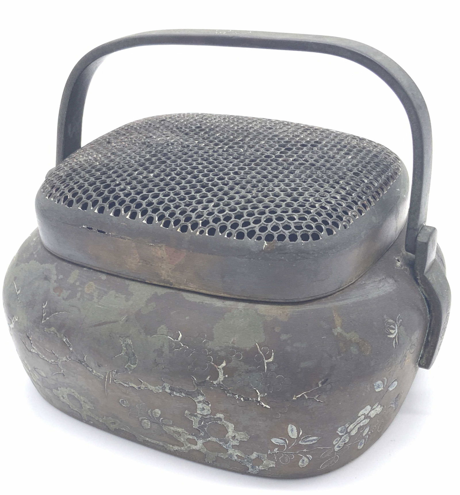 Vintage Etched Metal Cricket Box, Lidded: A vintage, possibly antique, etched metal cricket box with a perforated lid. The exterior of the piece is decorated with etched nature motifs that include foliage, birds, and insects. Piece has top ha