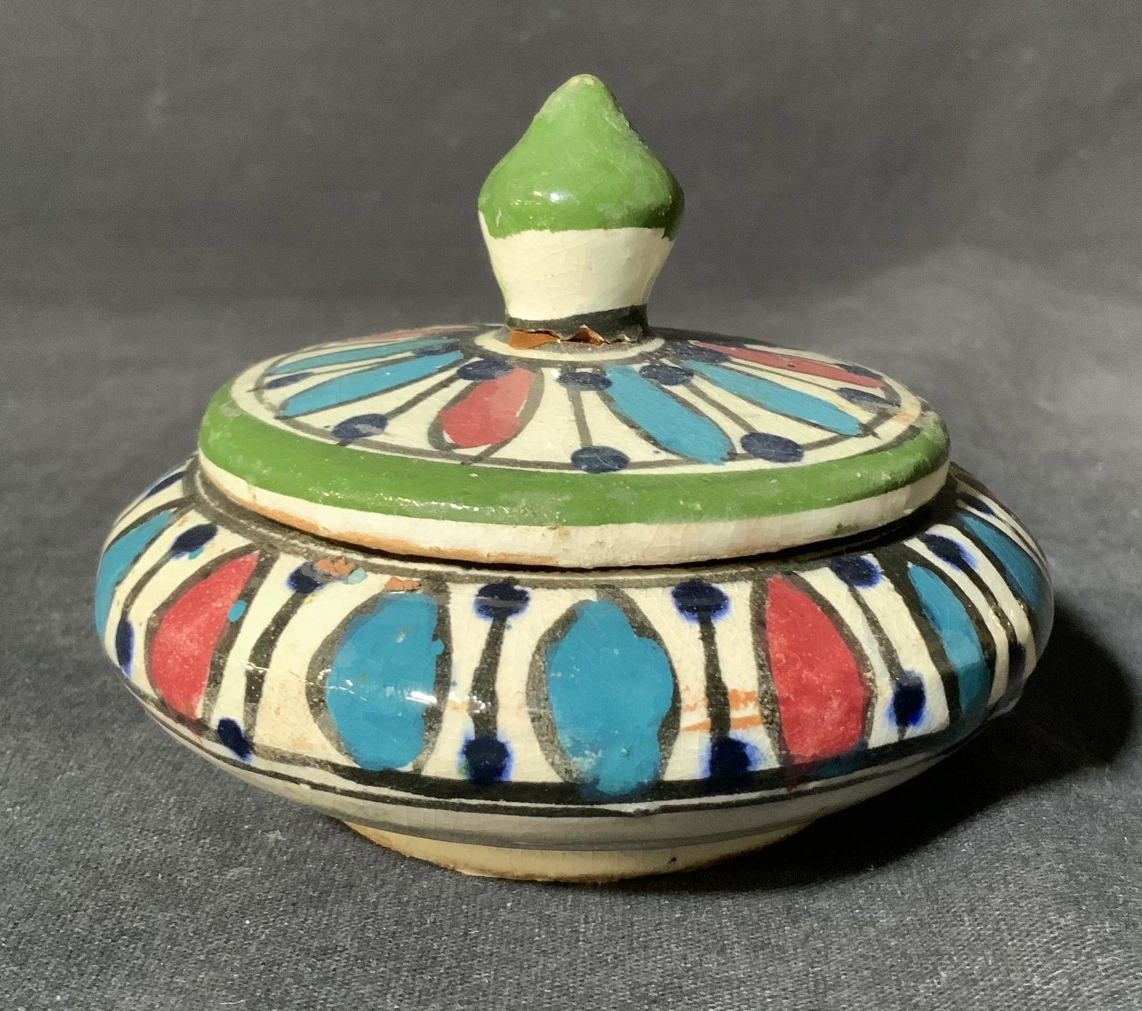 SAFI Ceramic Trinket Box: Safi Ceramic Trinket Box, inscription reads ‘Safi’, measures 2 7/8 inches tall x 3 5/8 inches in diameter, surface wear and chips to piece, previous repair to lid, Safi, ceramic, trinket dish, tri