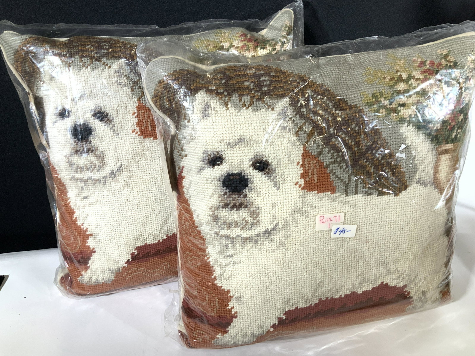 NIP HANDCRAFTED NEEDLEPOINT Pillows, 2: Pair West Highland White Terrier Handmade Needlepoint pillows with original tag attached and wrapped in cellophane. Labeled Maker- Union Trading Co. , tag attached. plush beige. backside with zipper. 
