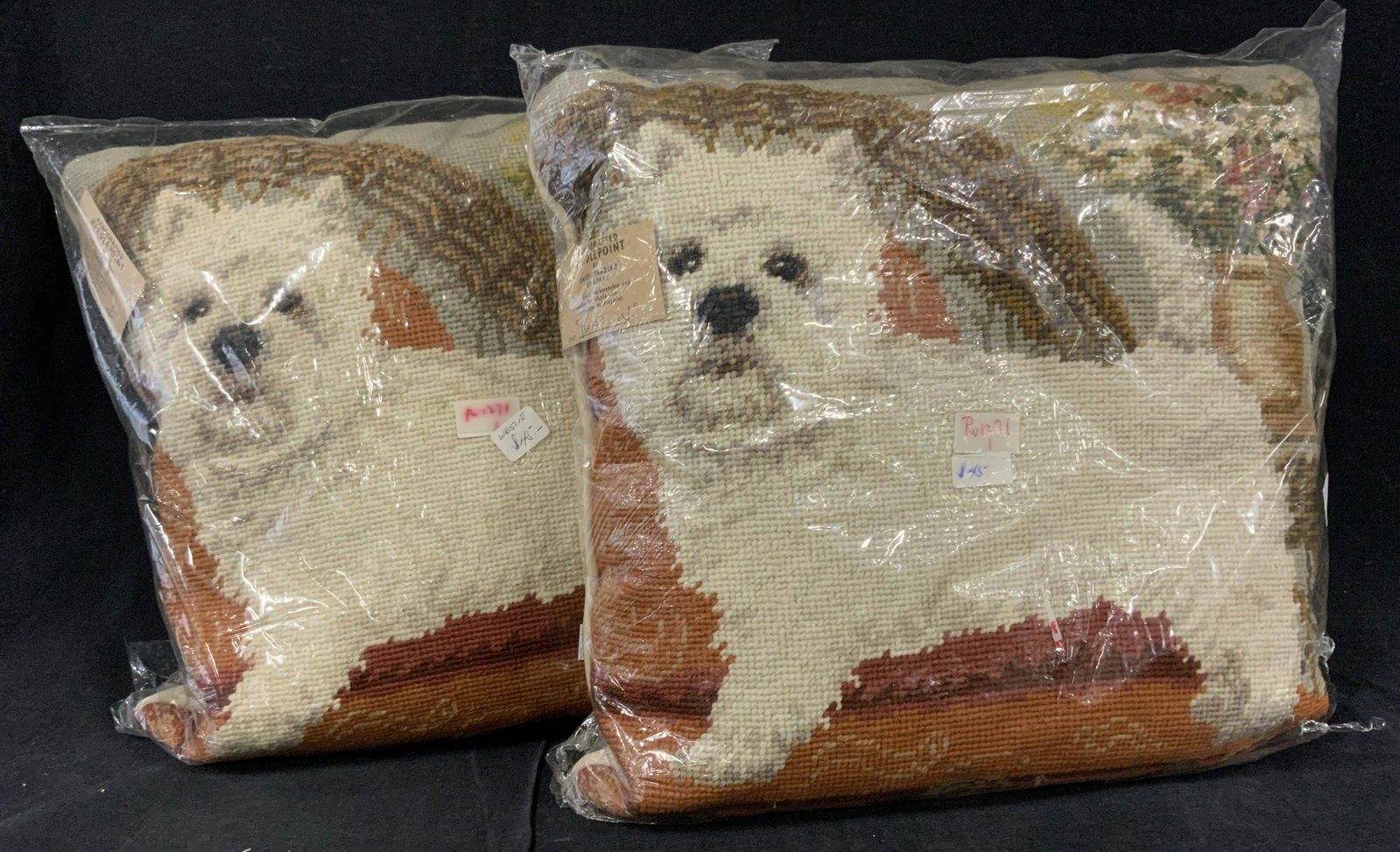 NIP Pair Needlepoint Throw Pillows: Pair West Highland White Terrier Handmade Needlepoint pillows with original tag attached and wrapped in cellophane. Labeled Maker- Union Trading Co. , tag attached. plush beige. backside with zipper. 