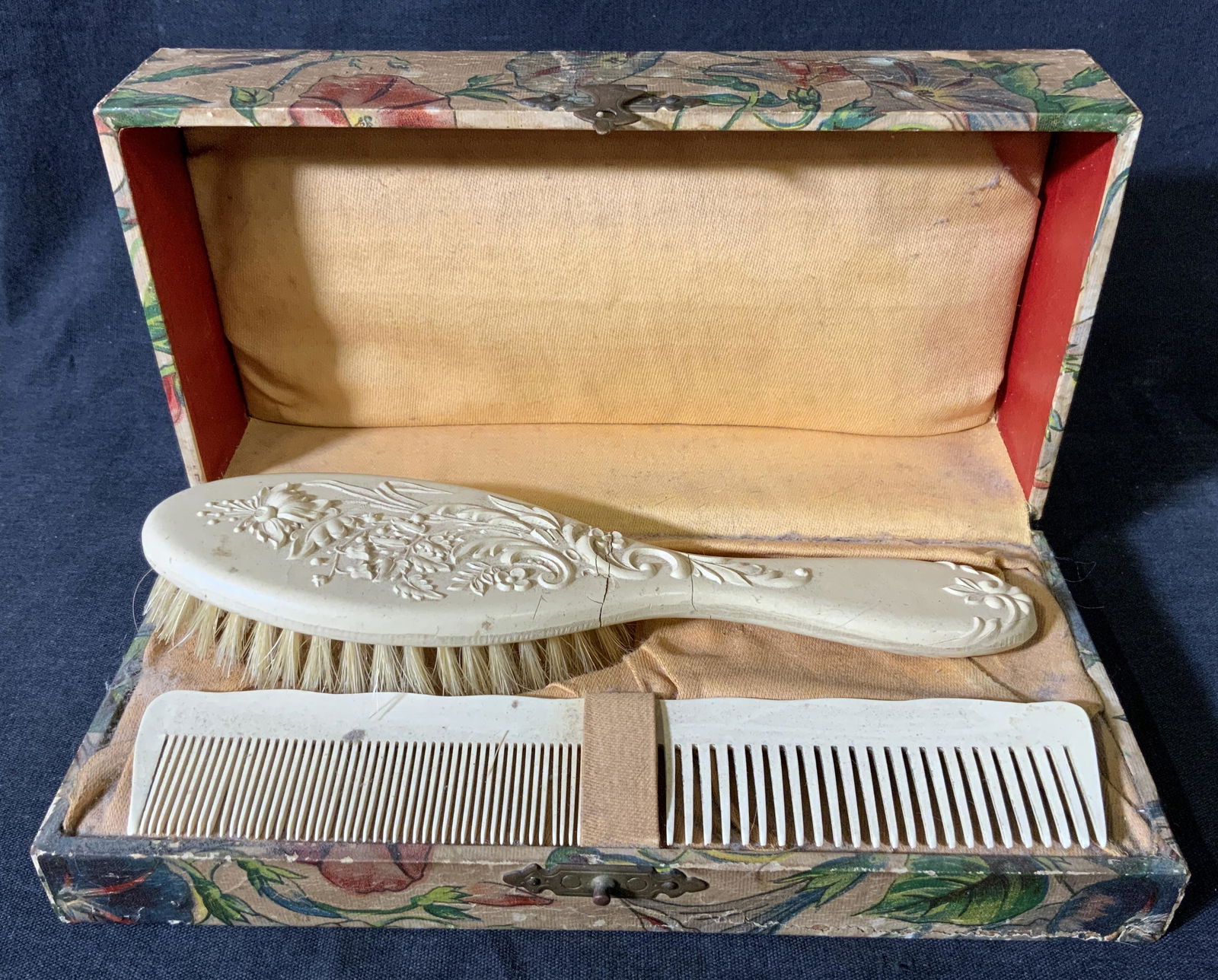 Antique Victorian Bakelite Dresser Set: Antique Victorian Bakelite Dresser Set, no apparent inscriptions or marks, box measures 2 3/8 inches tall x 7 5/8 inches wide, brush measures 7 inches long, comb measures 6 3/4 inches long, wear and c