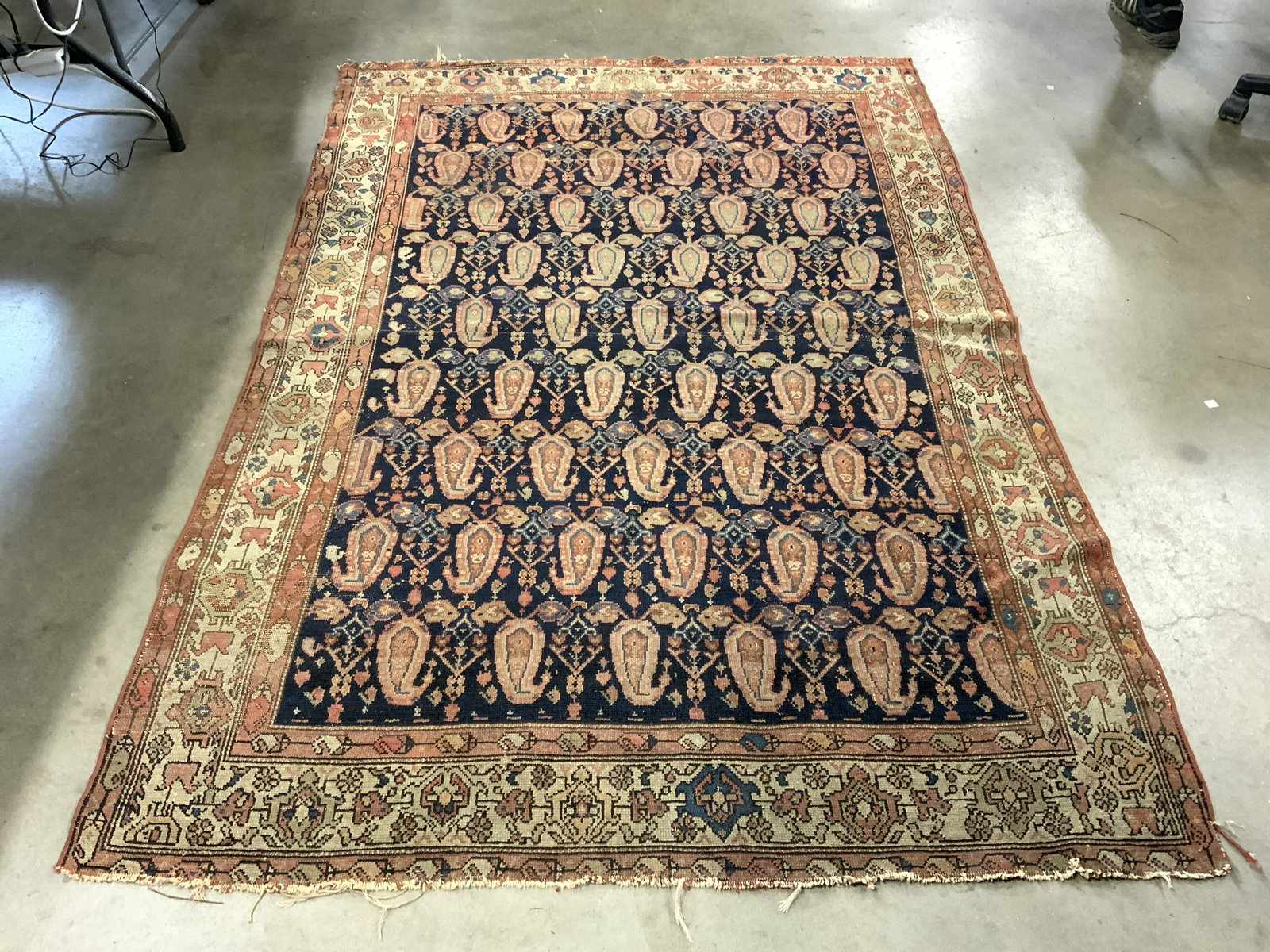 Vintage Handmade Wool Area Rug: Rug is wool and handmade. Piece is vintage. Contains intricate multi toned floral and geometric detail. Rug measures approx 83 inches long 55 inches wide. Rug, carpet, vintage rug, handmade rug, wool 